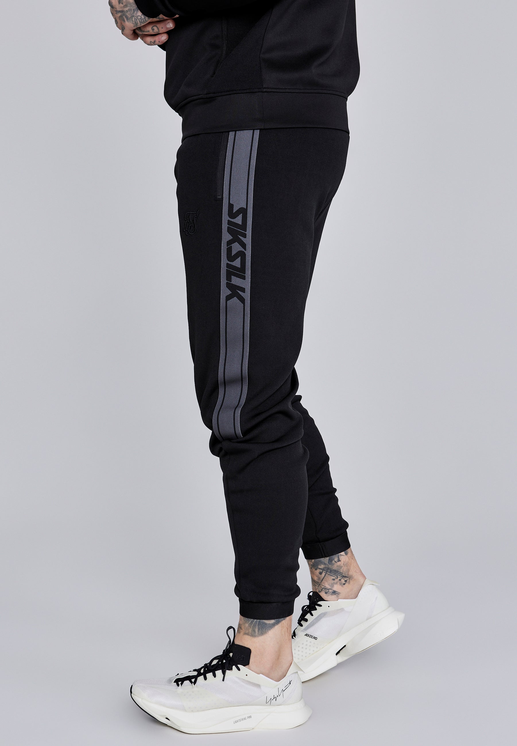 Joggers muscolosi in nero Pantaloni SikSilk