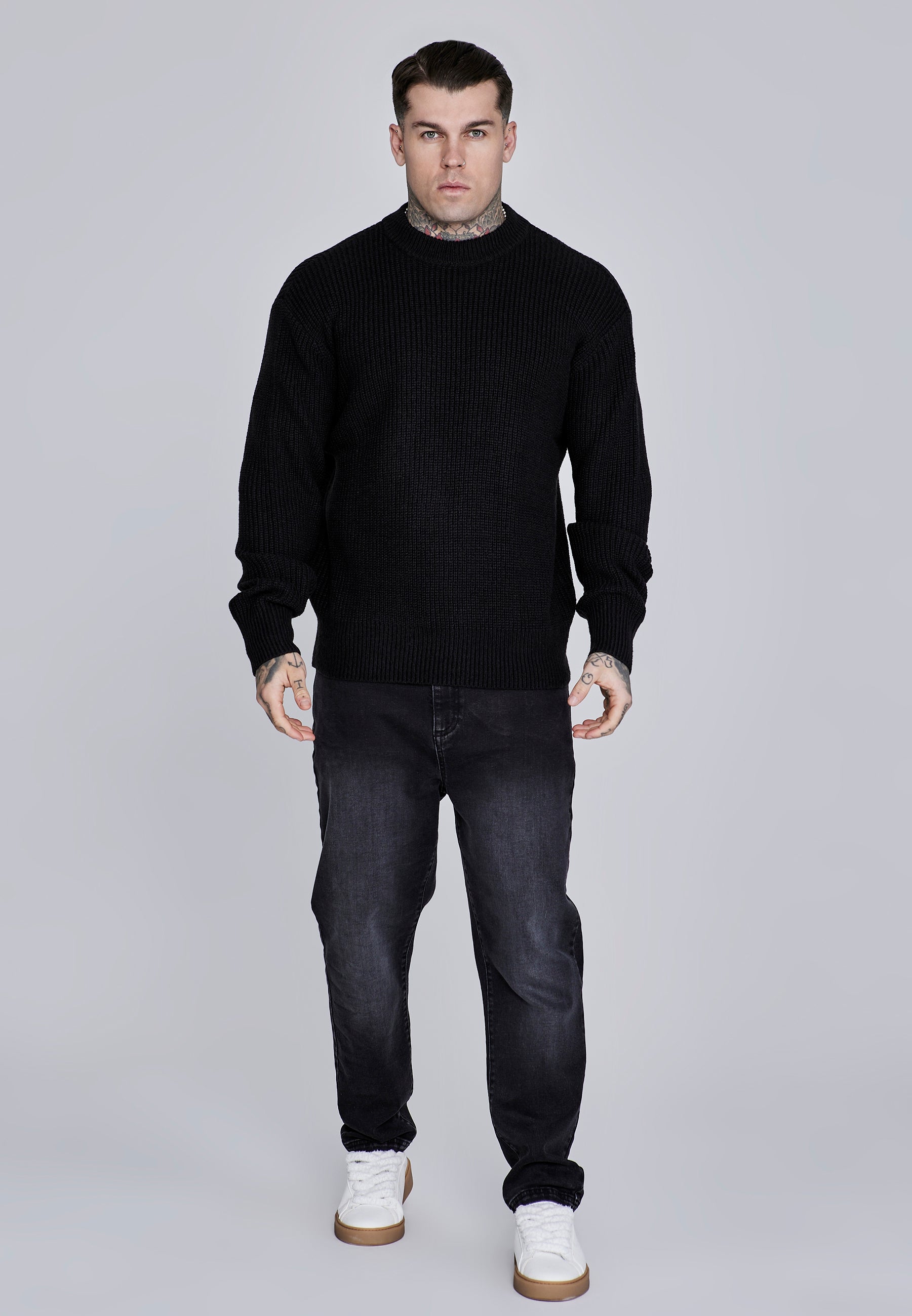 Maglione lavorato a maglia in nero Maglioni SikSilk
