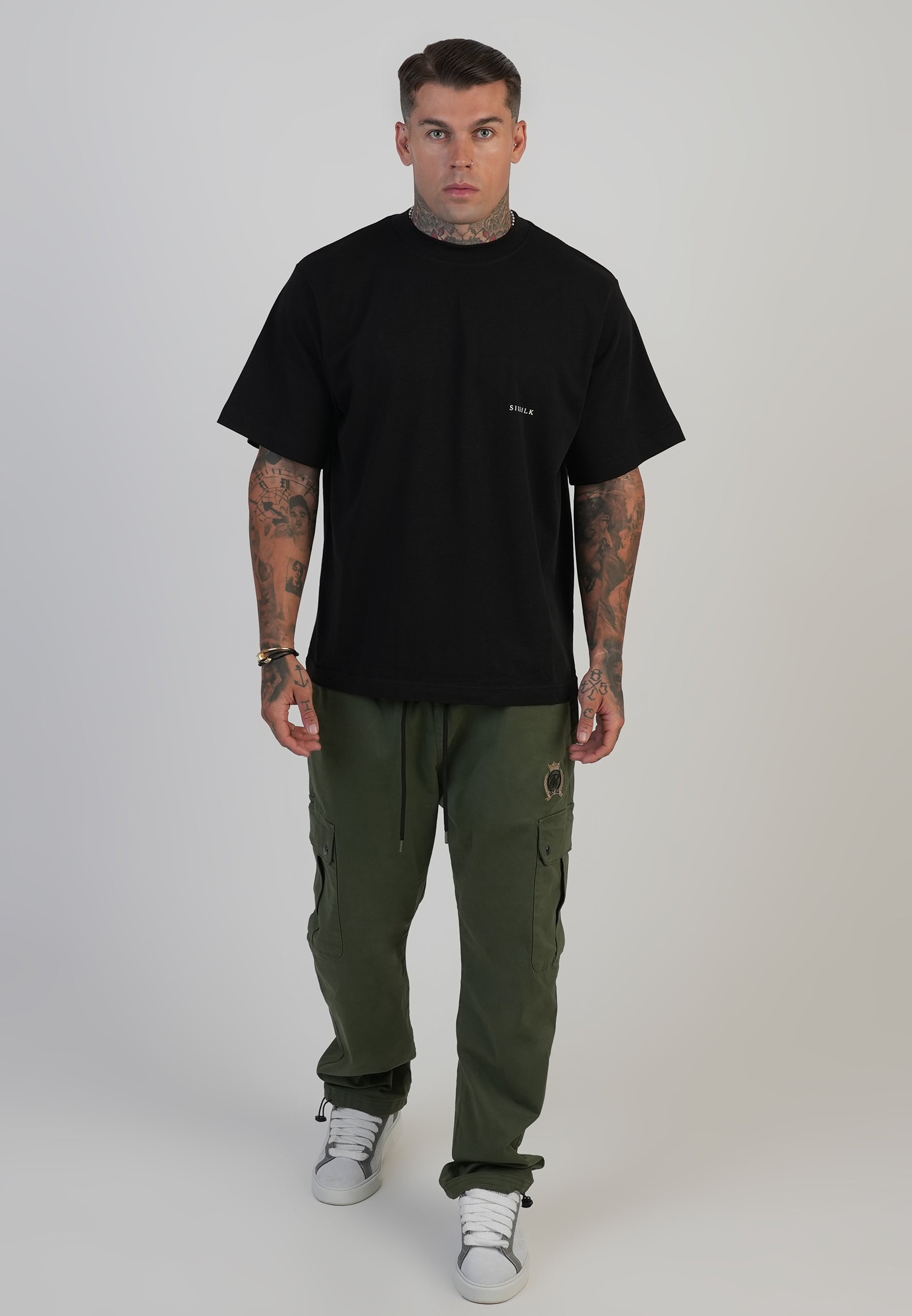 Pantaloni allentati Cargos in verde cachi SikSilk