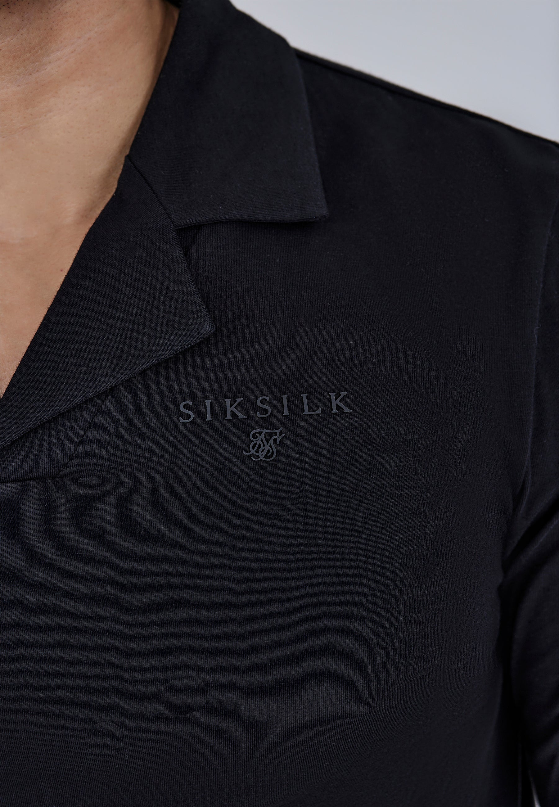 Polo a maniche lunghe in nero Magliette SikSilk
