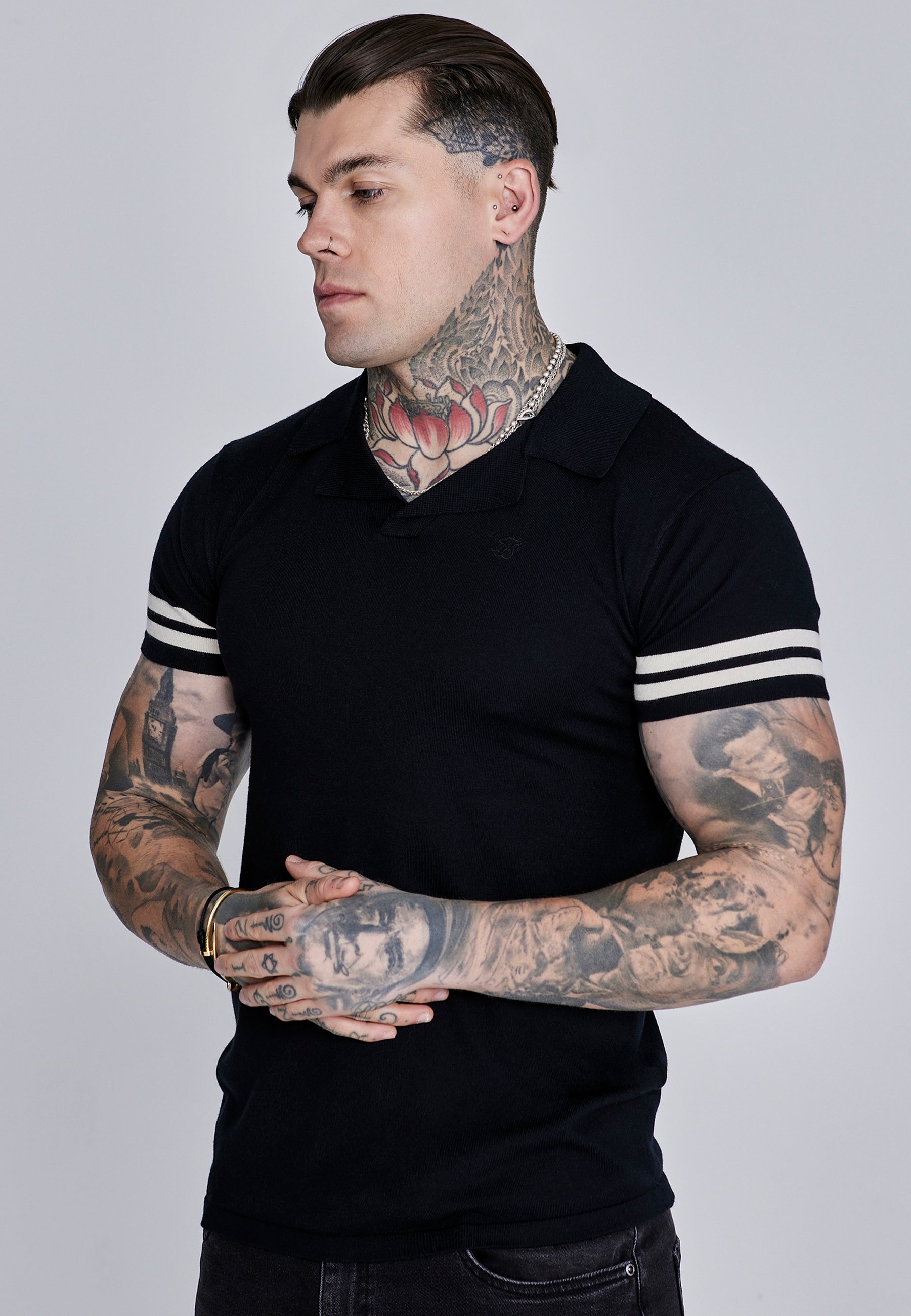 Polo Tournament Revere in nero Magliette SikSilk