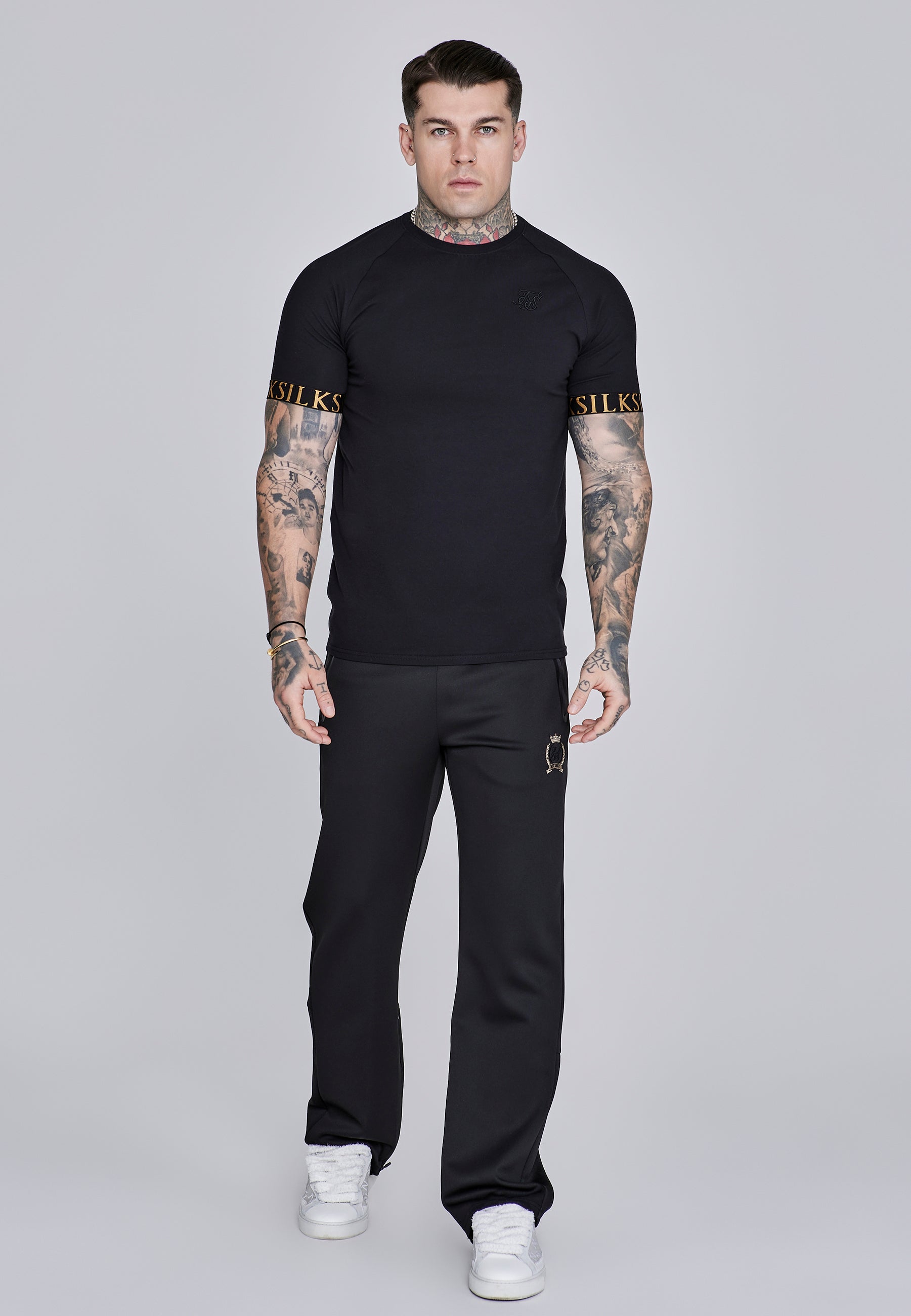 Pantaloni da corsa in nero Pantaloni SikSilk