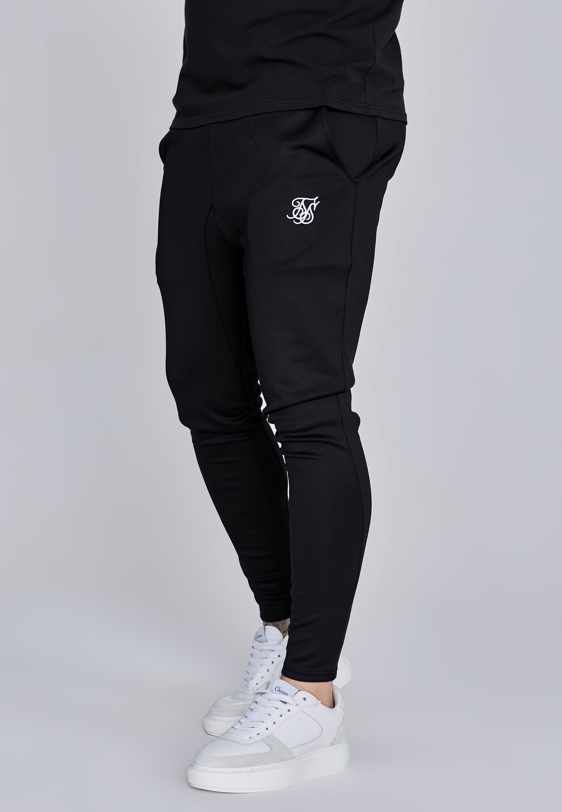 Joggers Essentials in poliestere nero Pantaloni SikSilk