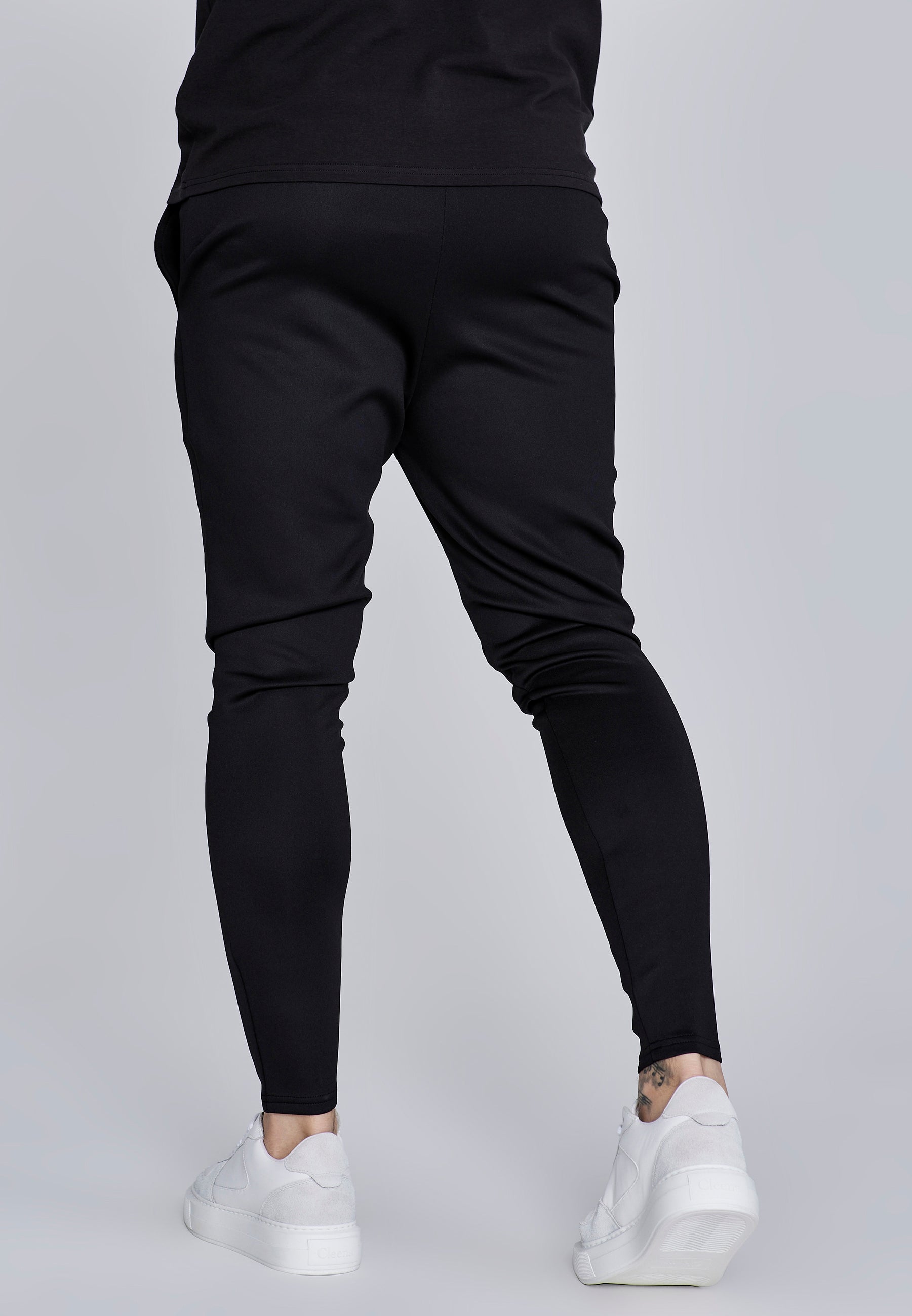 Joggers Essentials in poliestere nero Pantaloni SikSilk