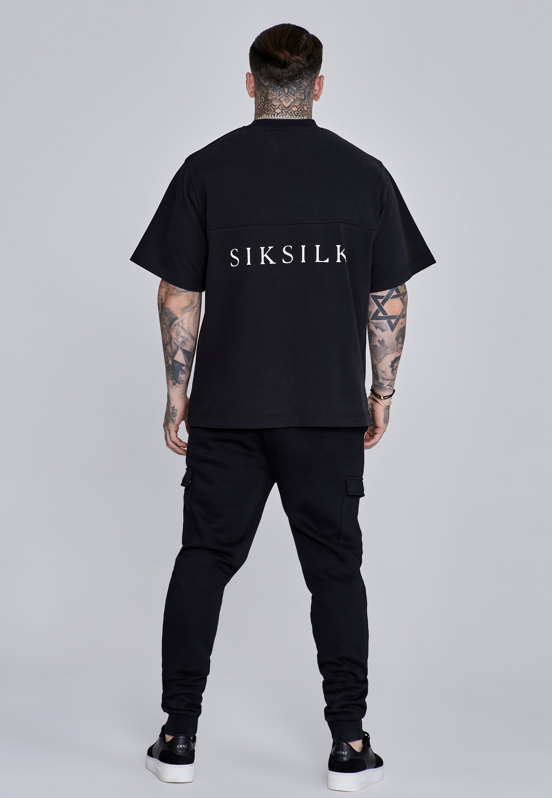 Joggers Cargo Essentials in nero Pantaloni SikSilk