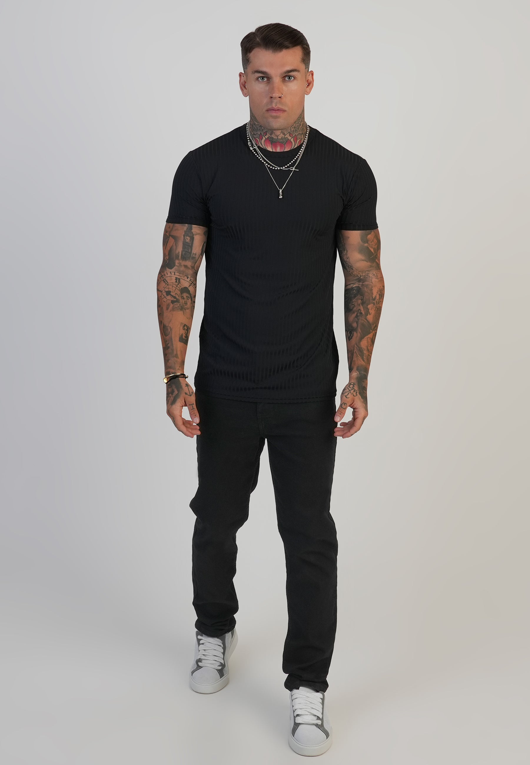Jeans slim fit in nero Jeans SikSilk