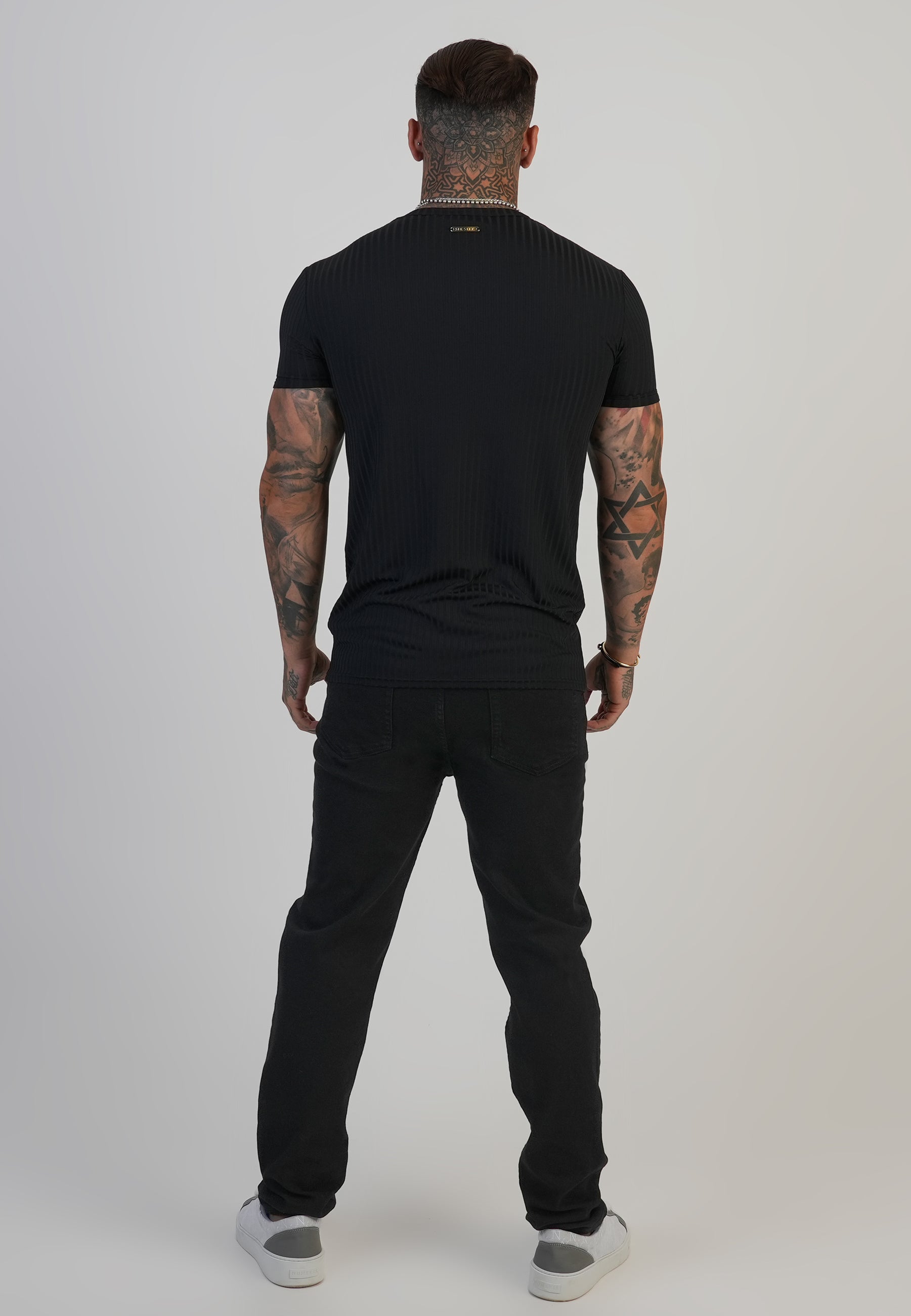 Jeans slim fit in nero Jeans SikSilk