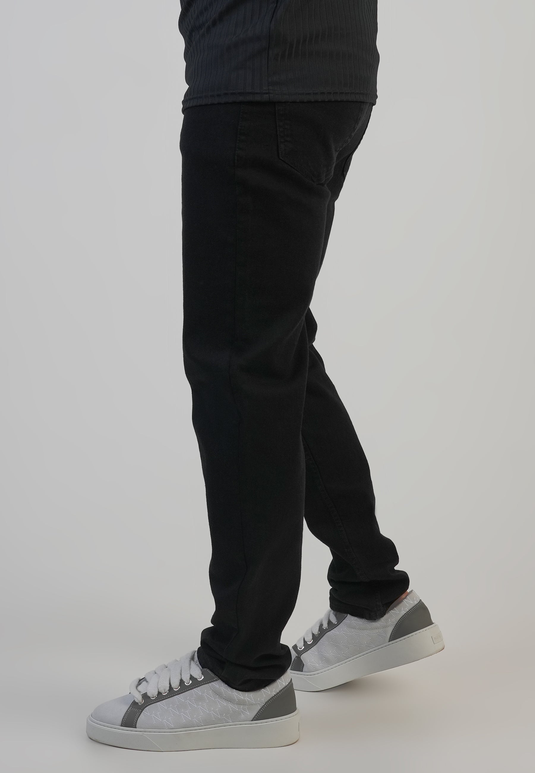 Jeans slim fit in nero Jeans SikSilk