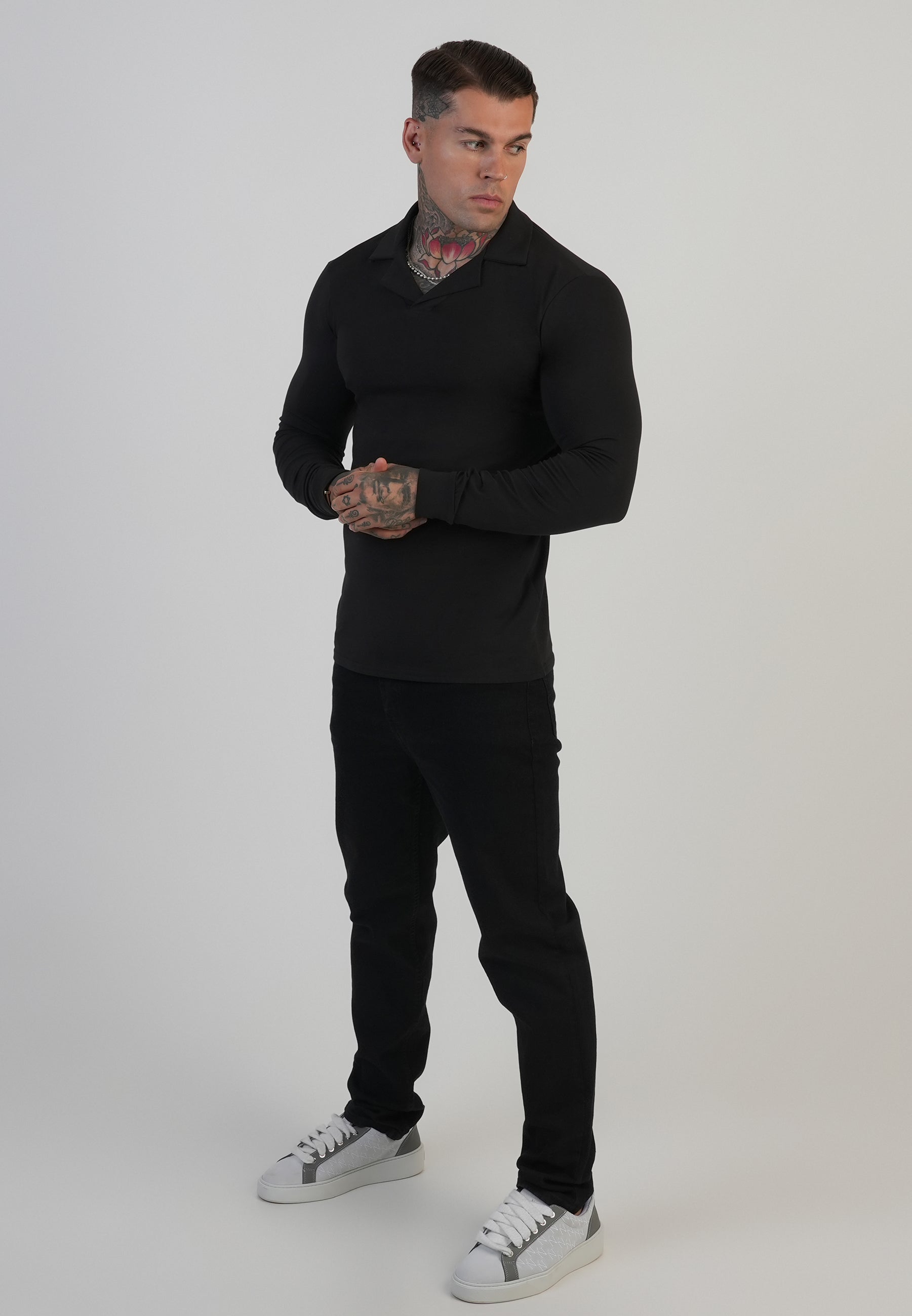 Polo Revere a maniche lunghe in nero Magliette SikSilk