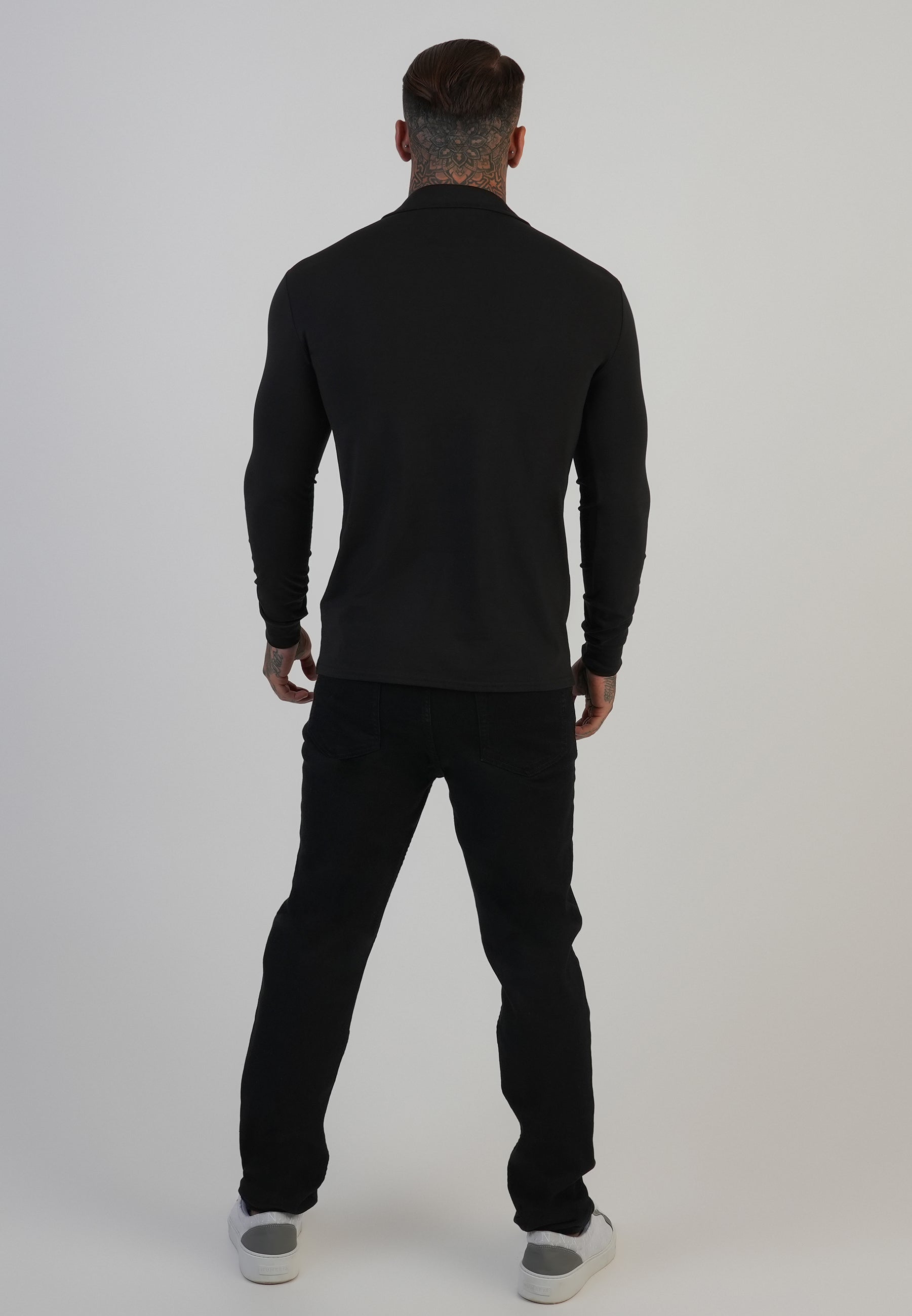 Polo Revere a maniche lunghe in nero Magliette SikSilk