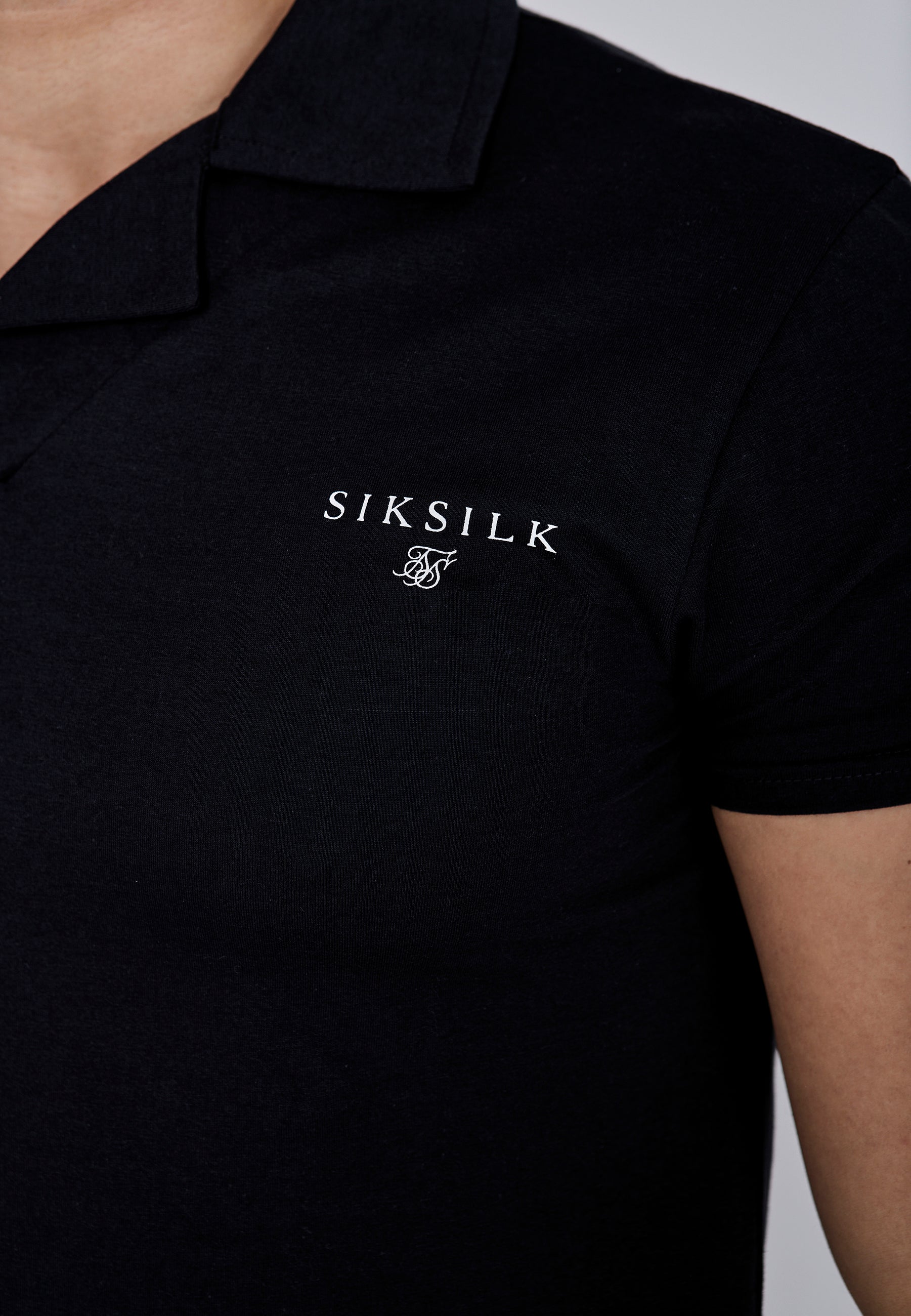 Polo Revere in nero Magliette SikSilk
