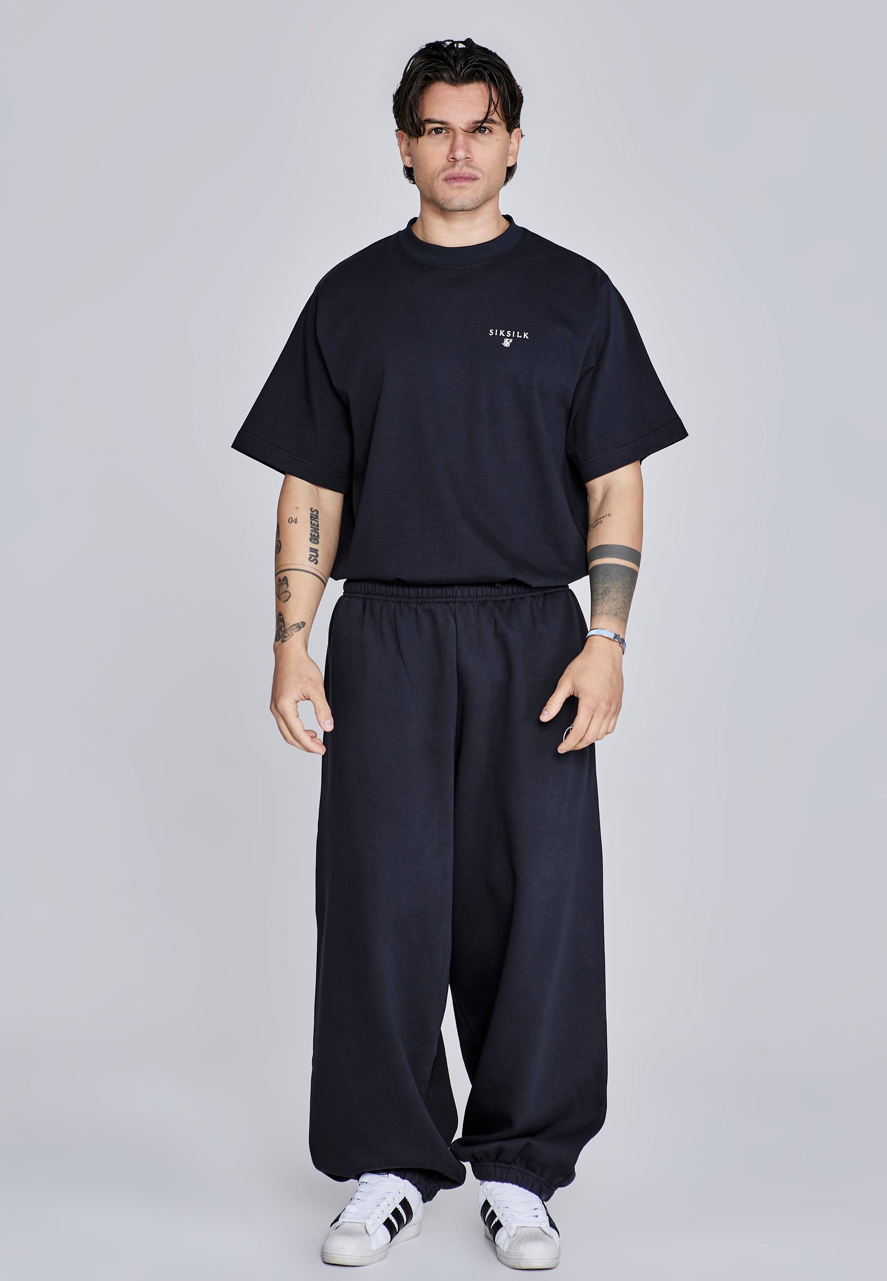 Joggers essenziali in nero Pantaloni SikSilk