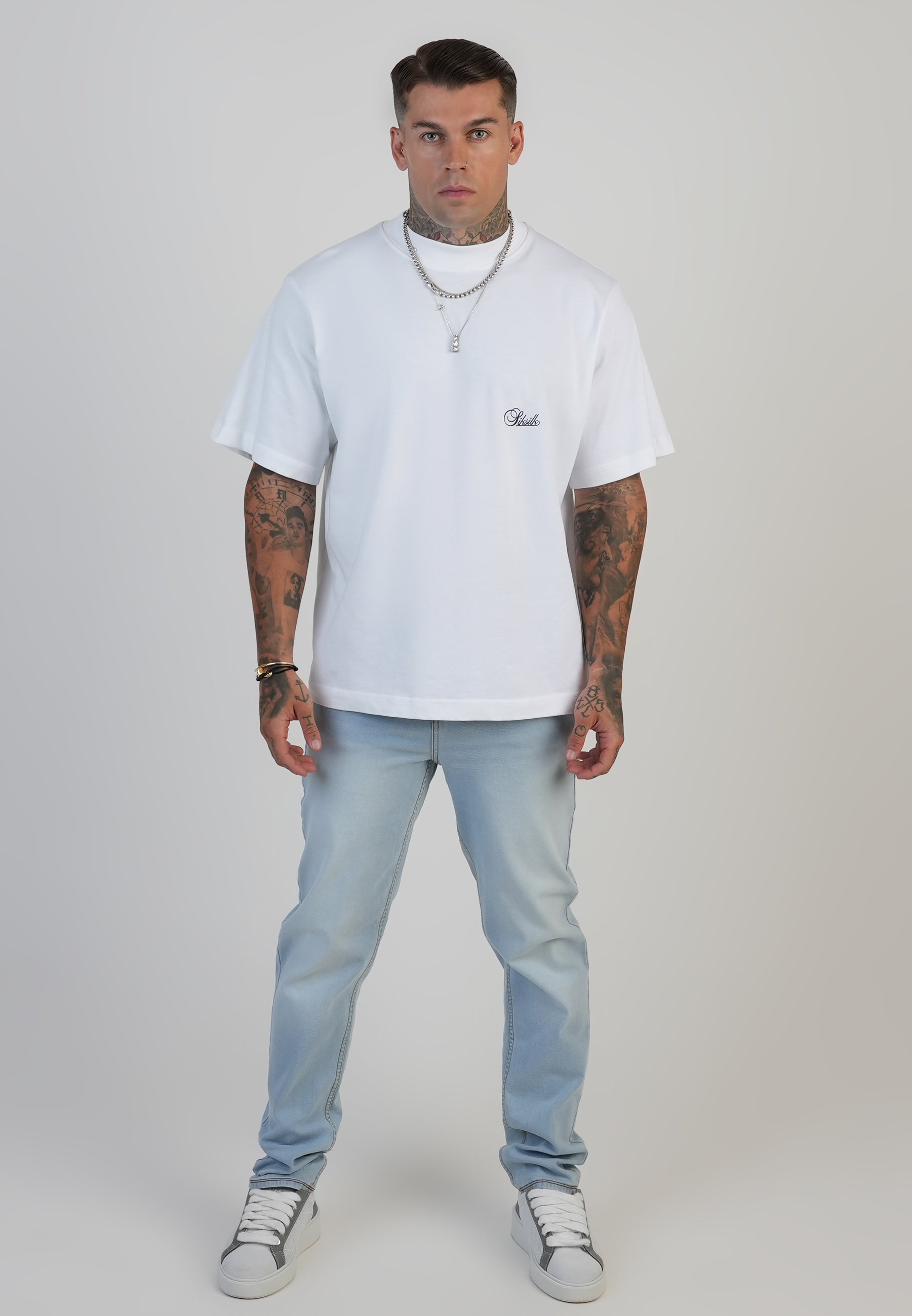 Jeans slim fit in azzurro lavato SikSilk