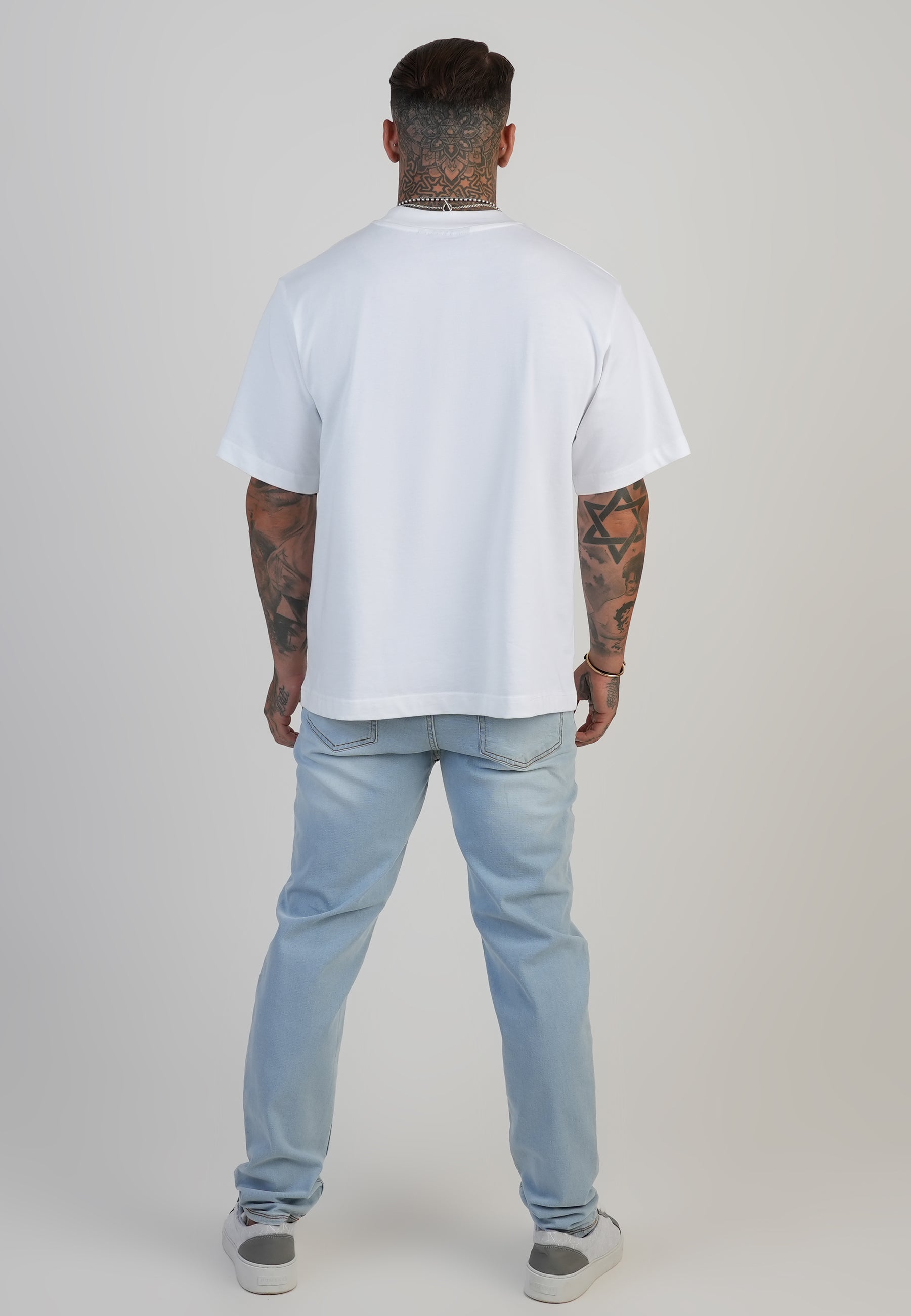 Jeans slim fit in azzurro lavato SikSilk