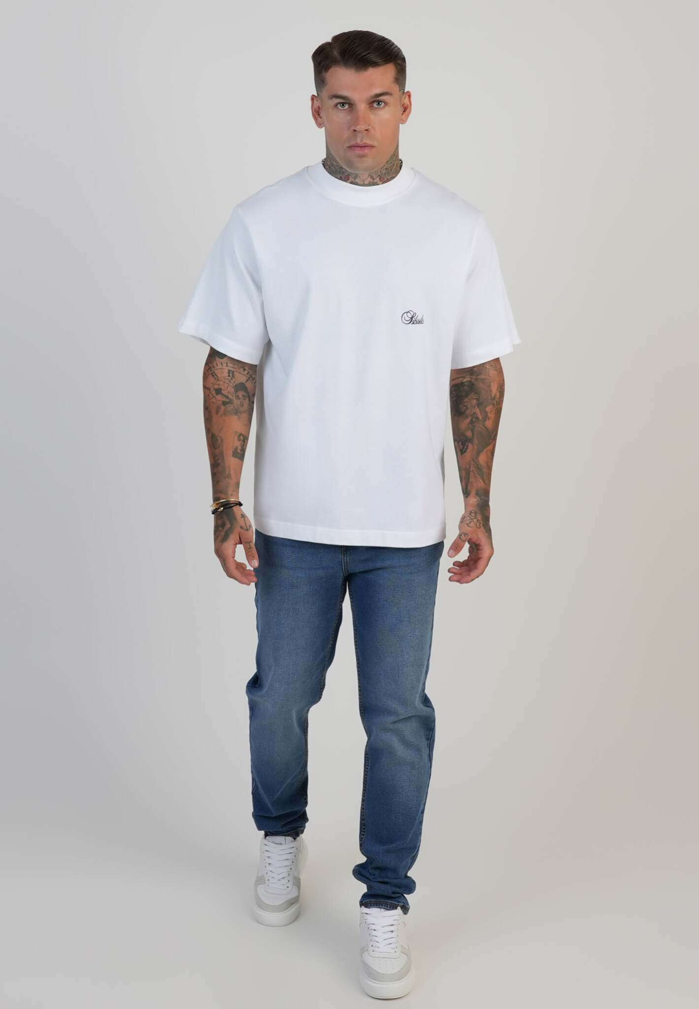 Jeans slim fit in blu medio lavato SikSilk