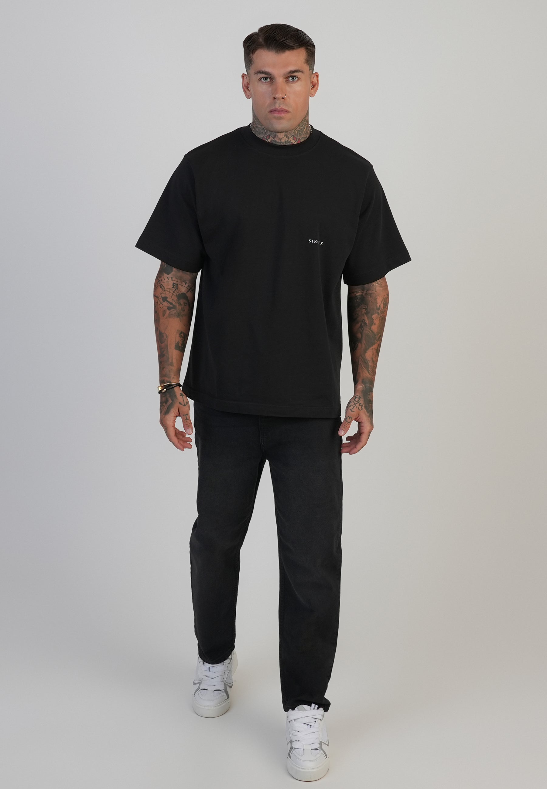 Jeans Tapered in nero lavato SikSilk