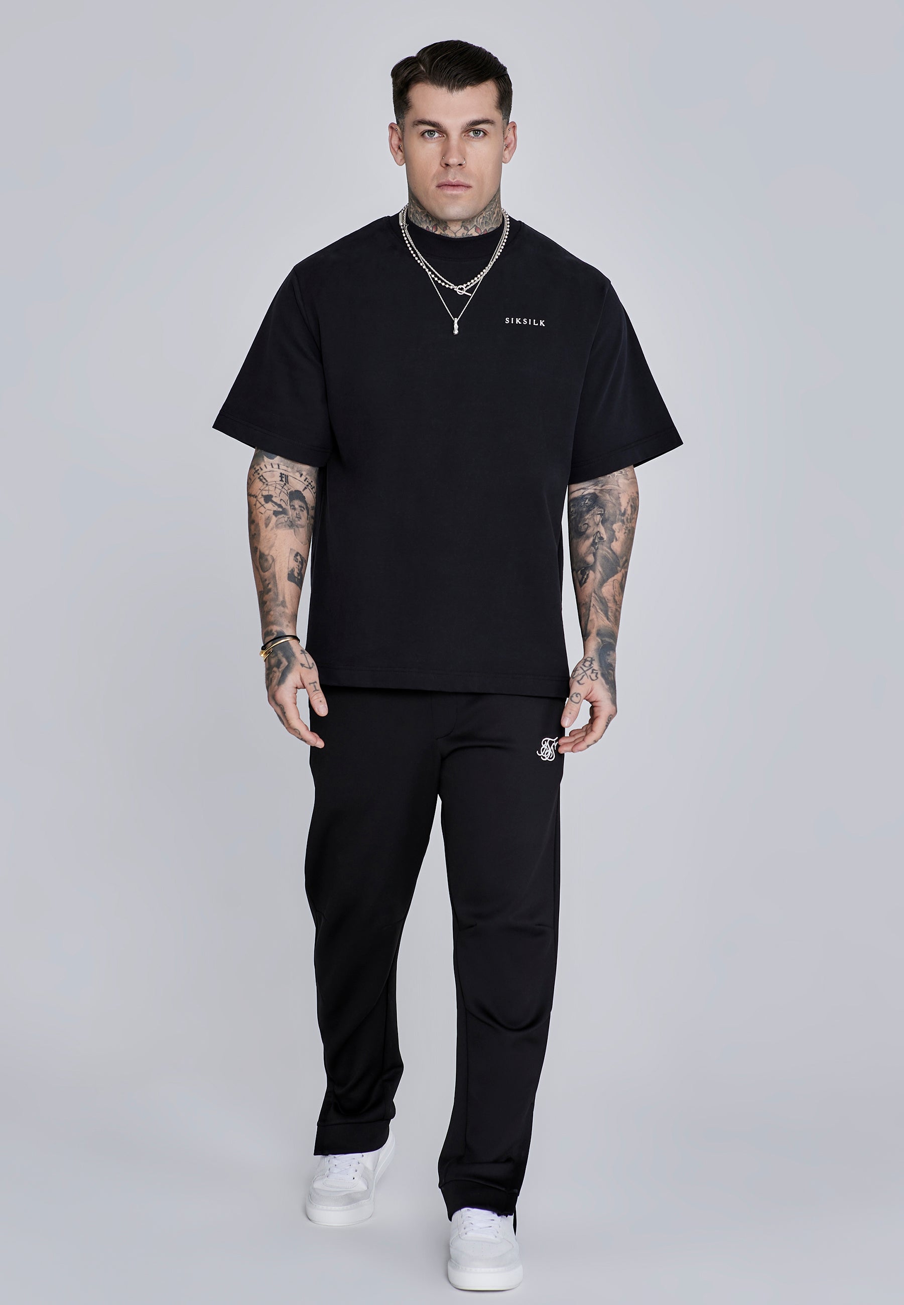 Joggers Essentials in poliestere nero Pantaloni SikSilk