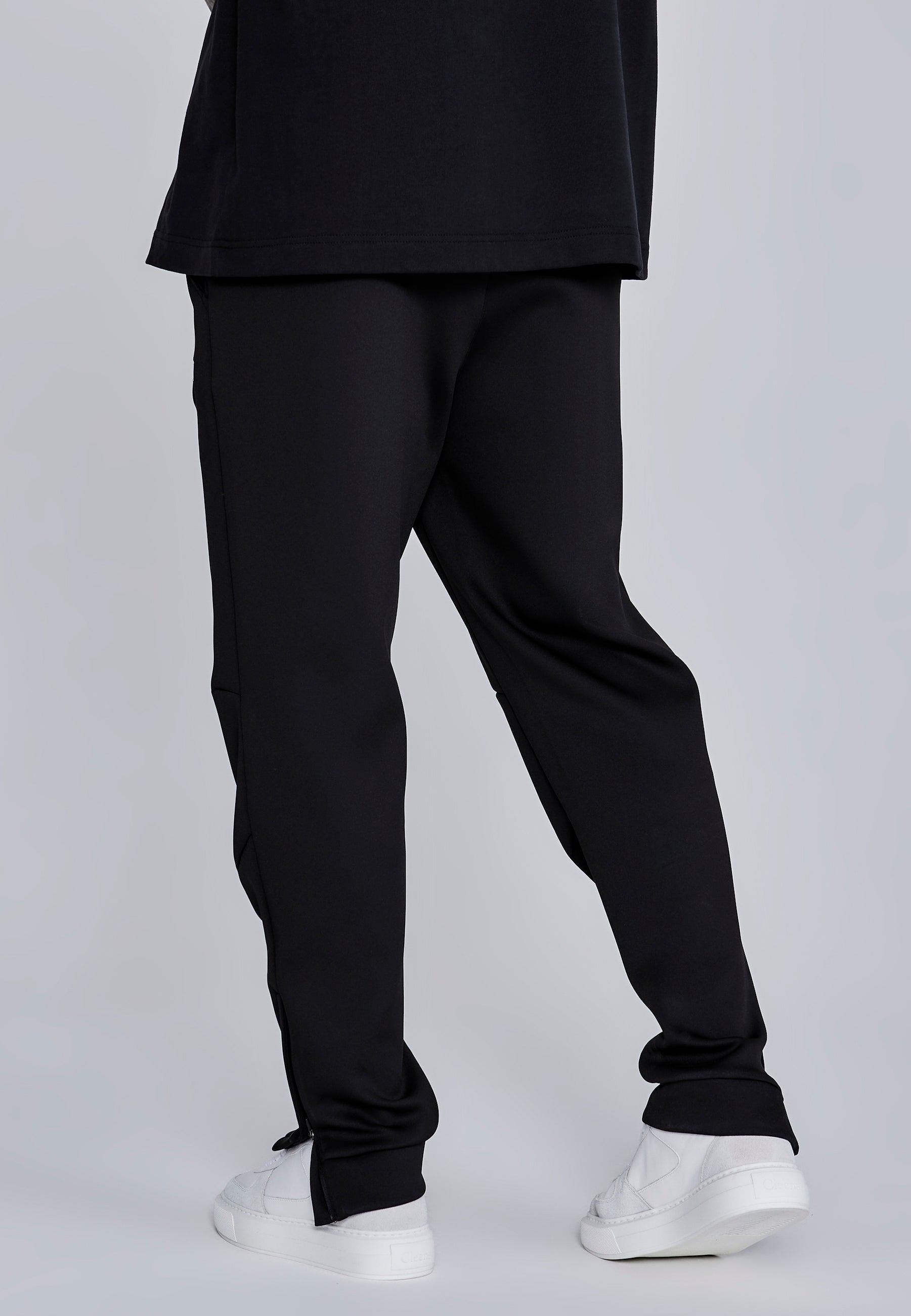 Joggers Essentials in poliestere nero Pantaloni SikSilk