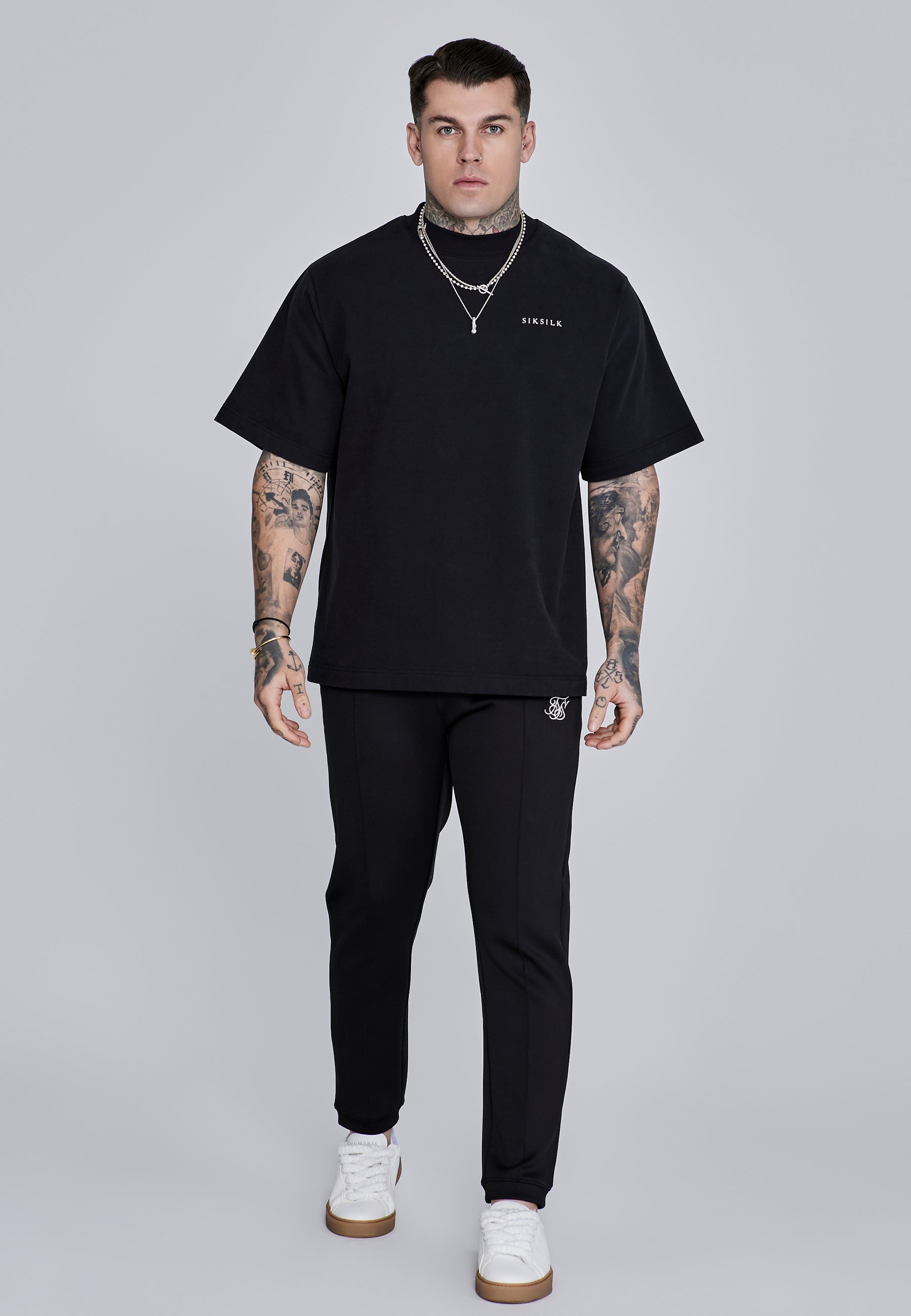 Pantaloni Essentials a pieghe in nero Pantaloni SikSilk