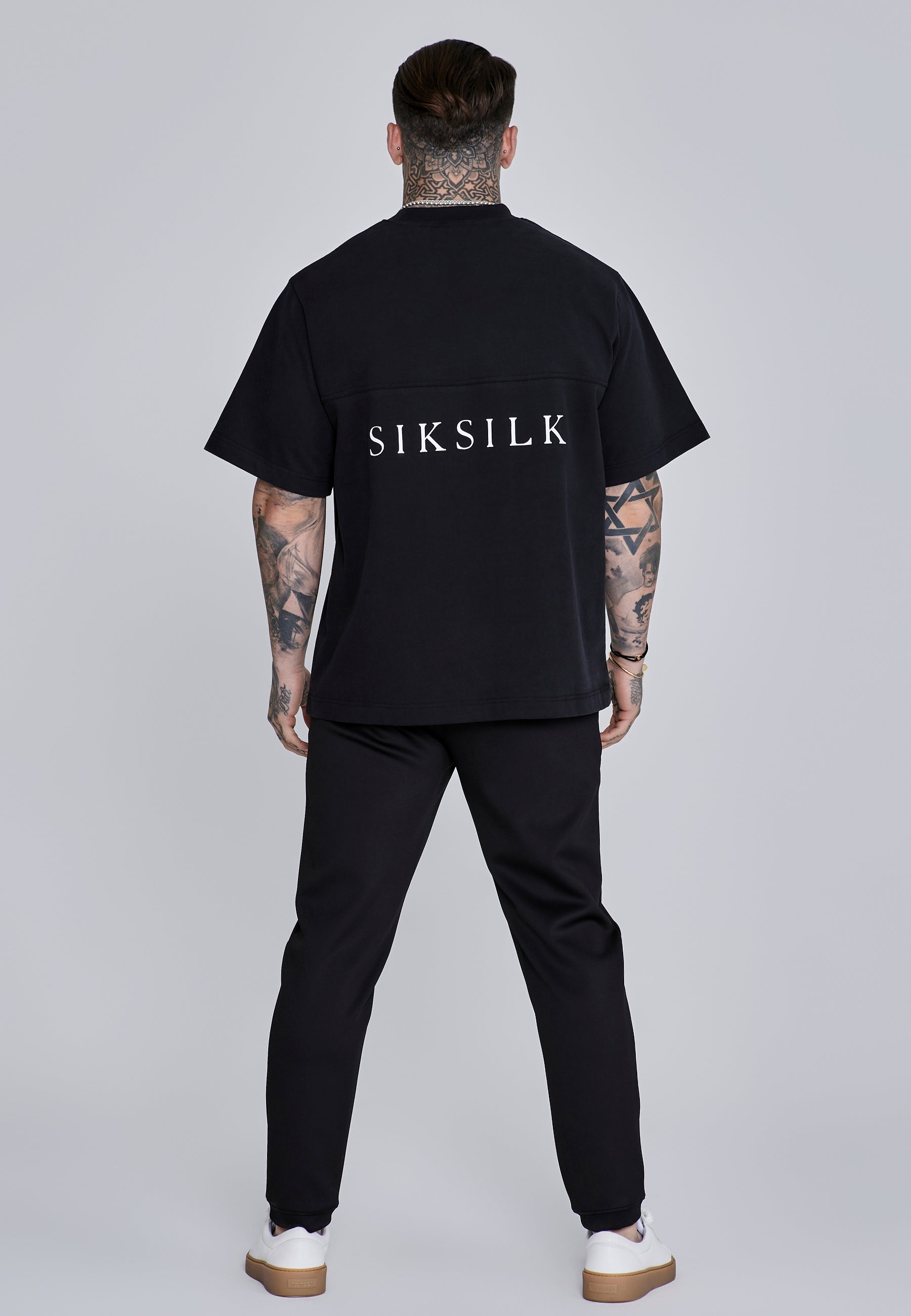 Pantaloni Essentials a pieghe in nero Pantaloni SikSilk