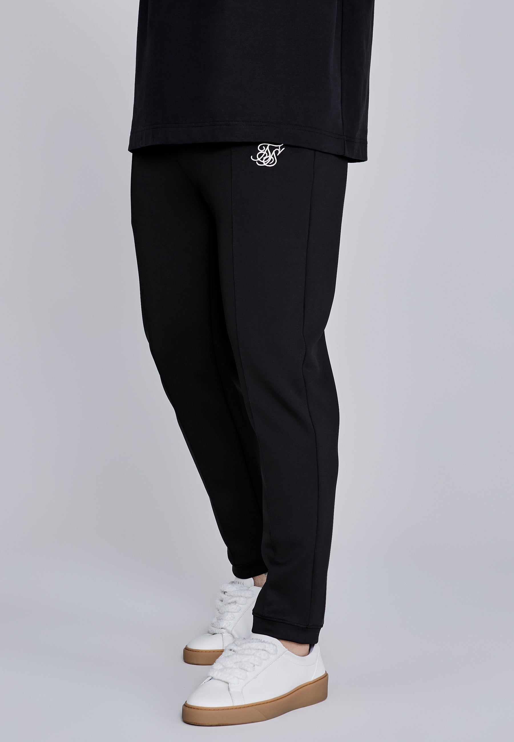 Pantaloni Essentials a pieghe in nero Pantaloni SikSilk