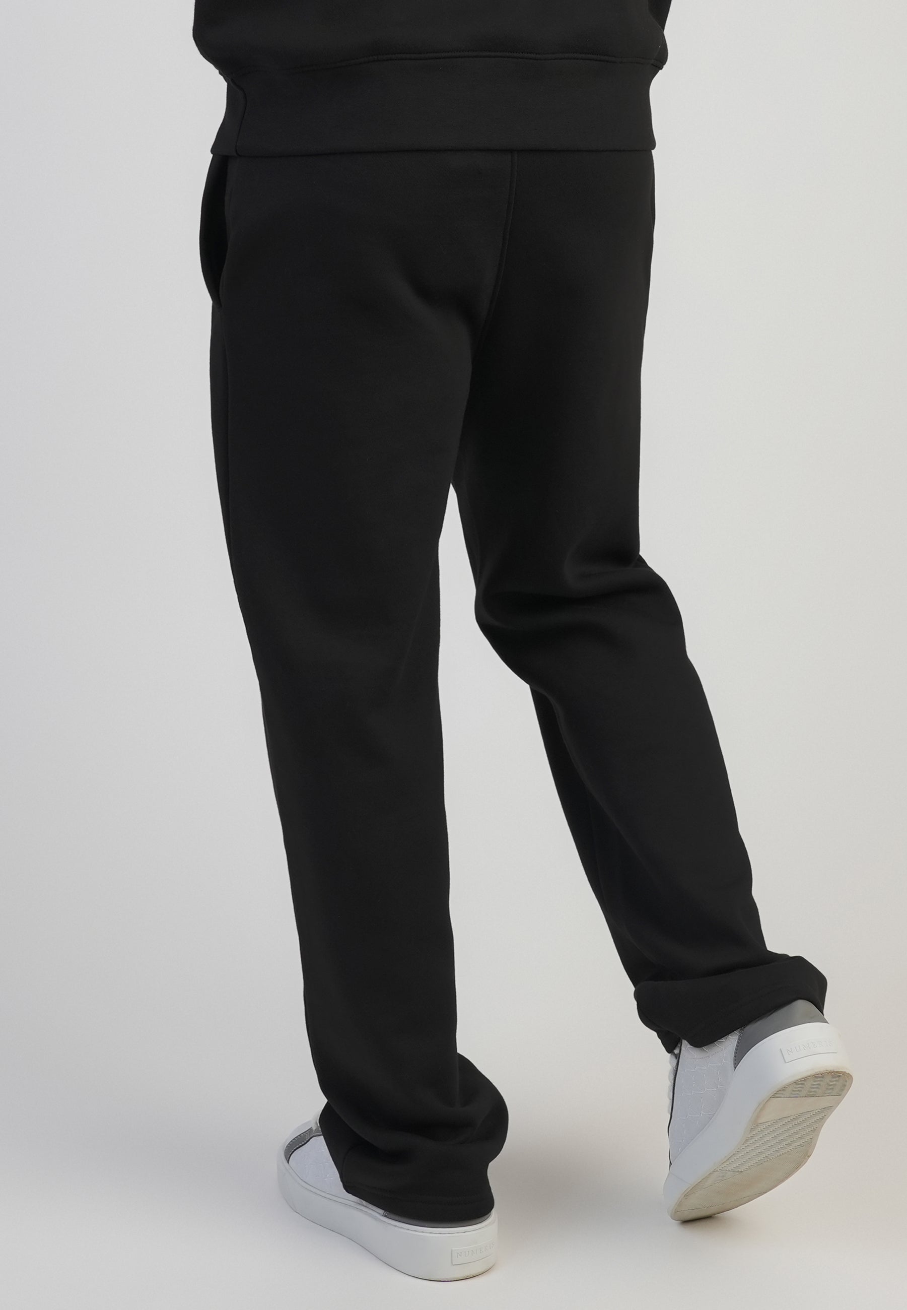 Pantaloni da corsa in nero Pantaloni SikSilk