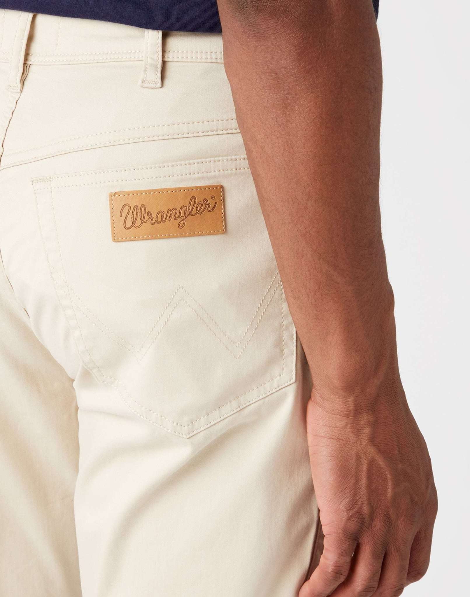 Pantaloni Texas Slim in pietra pomice Pantaloni Wrangler