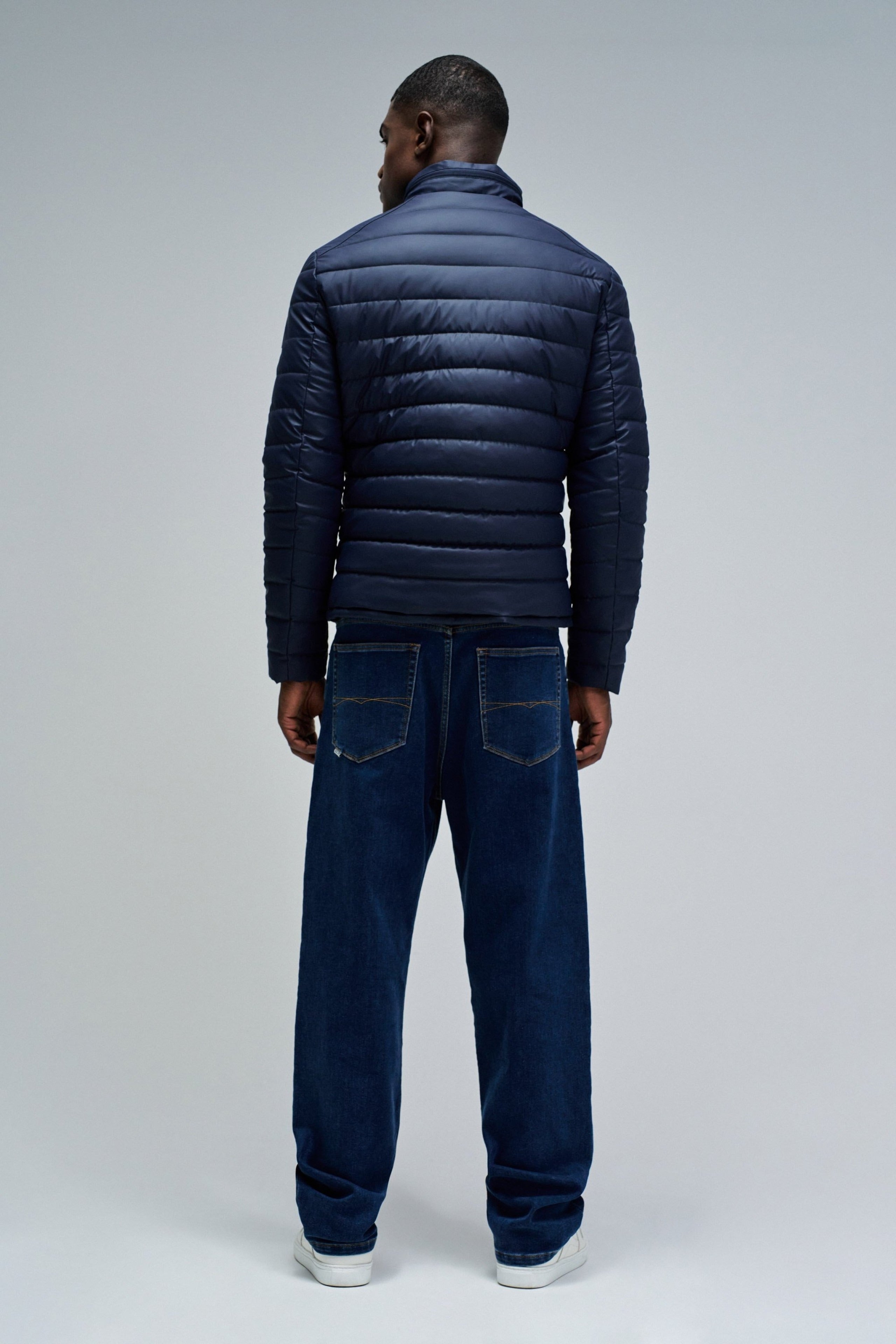 Giacca leggera imbottita in pelle PU blu scuro