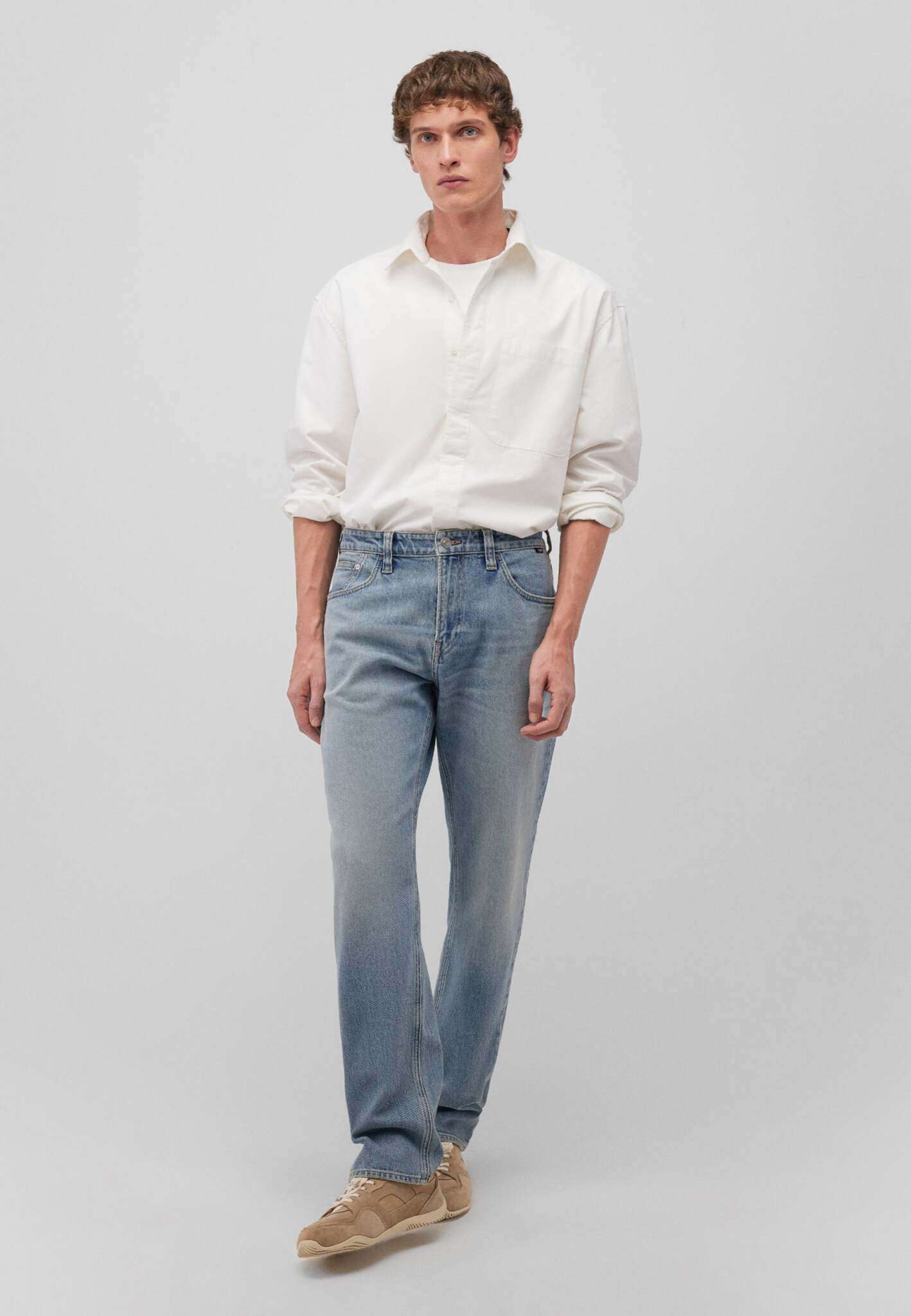 Lisbona in jeans vintage usati e nebbiosi Mavi