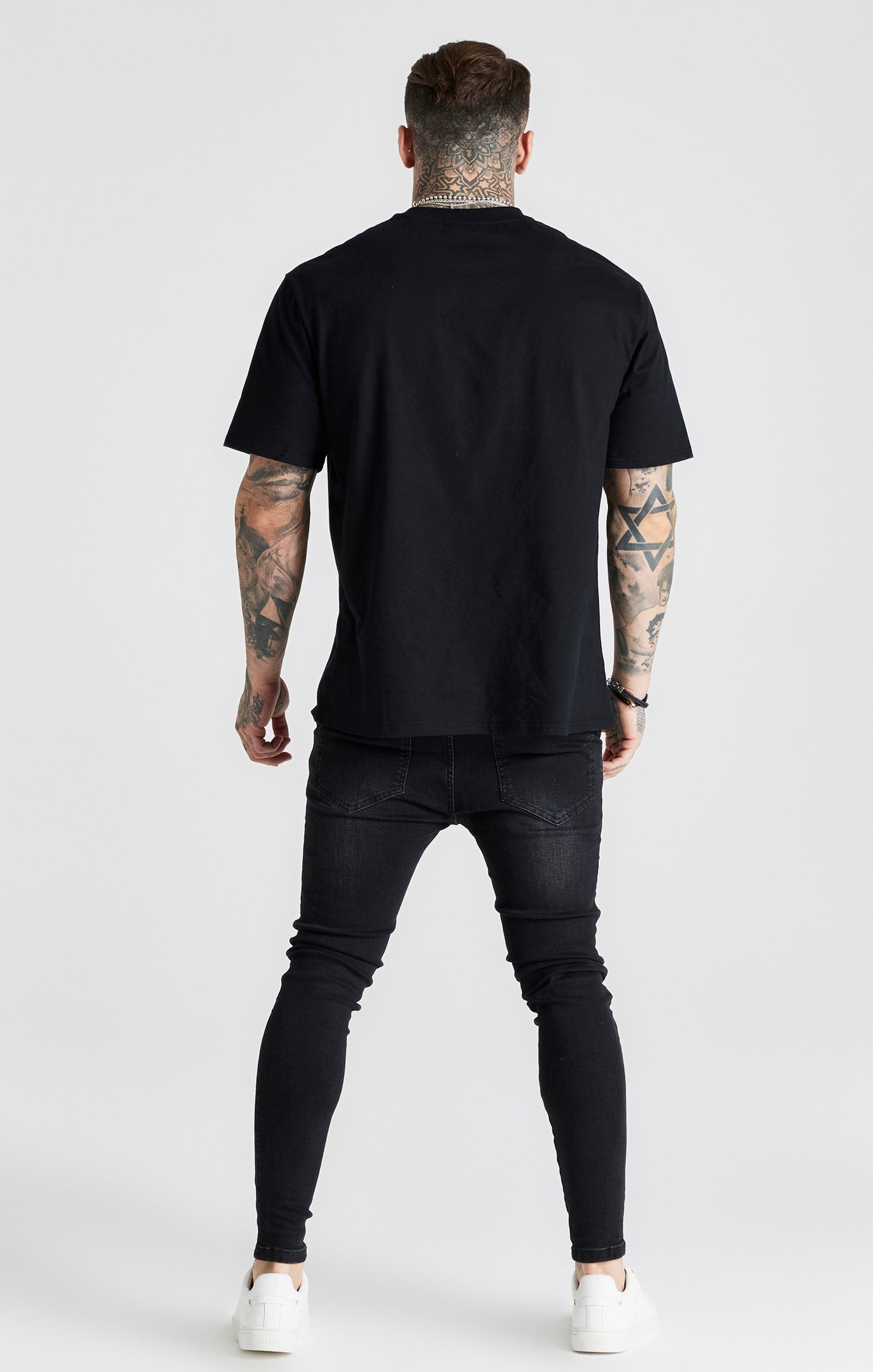 Jeans skinny essenziali in nero SikSilk   