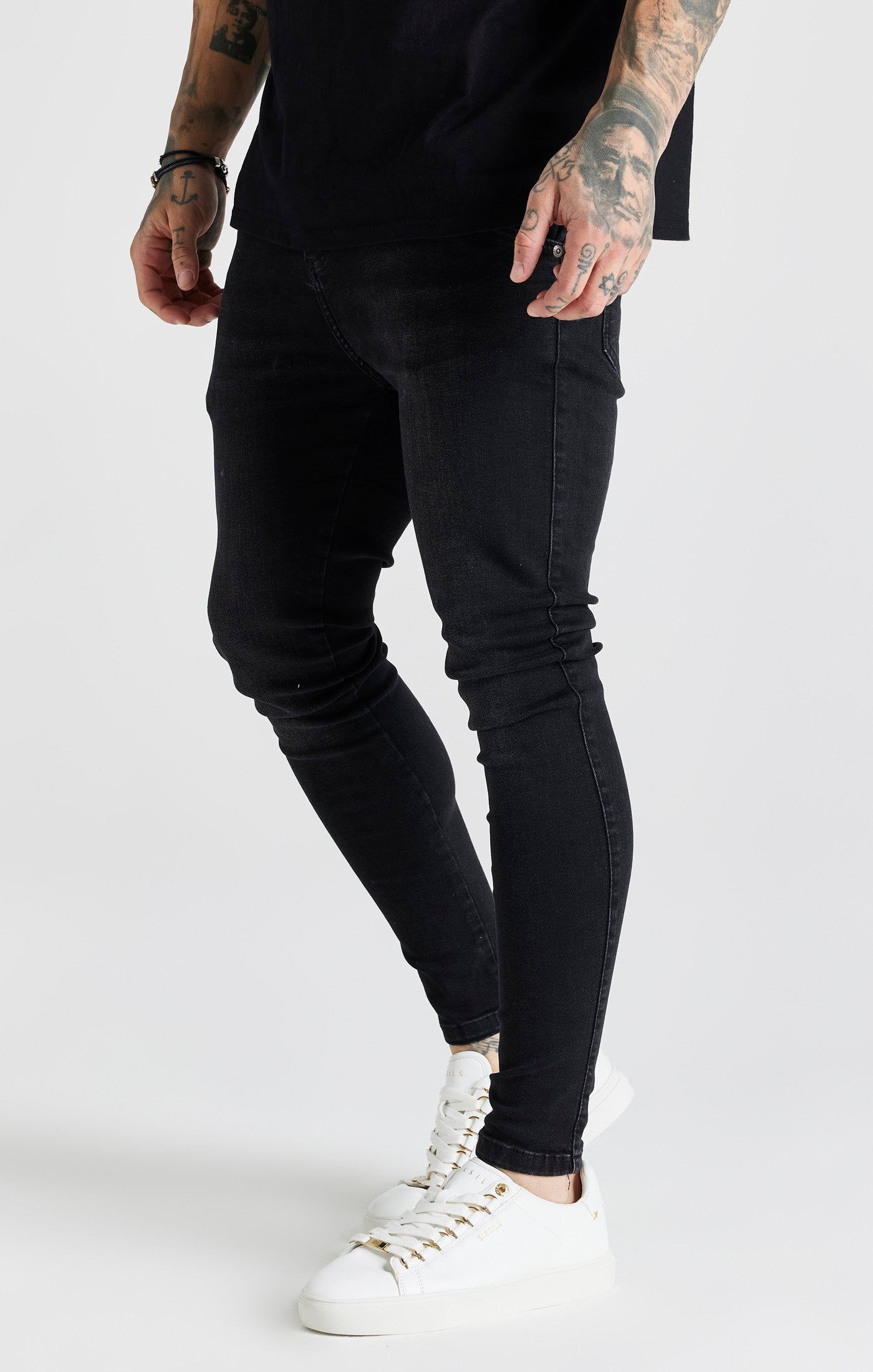 Jeans skinny essenziali in nero SikSilk   