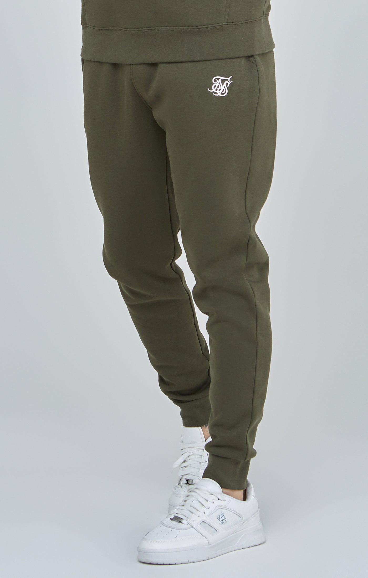 Jogger essenziale con risvolto in pantaloni color kaki SikSilk   