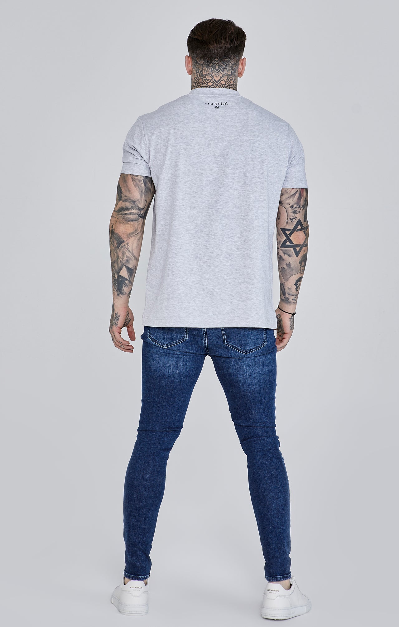 Jeans skinny invecchiati in jeans blu SikSilk   