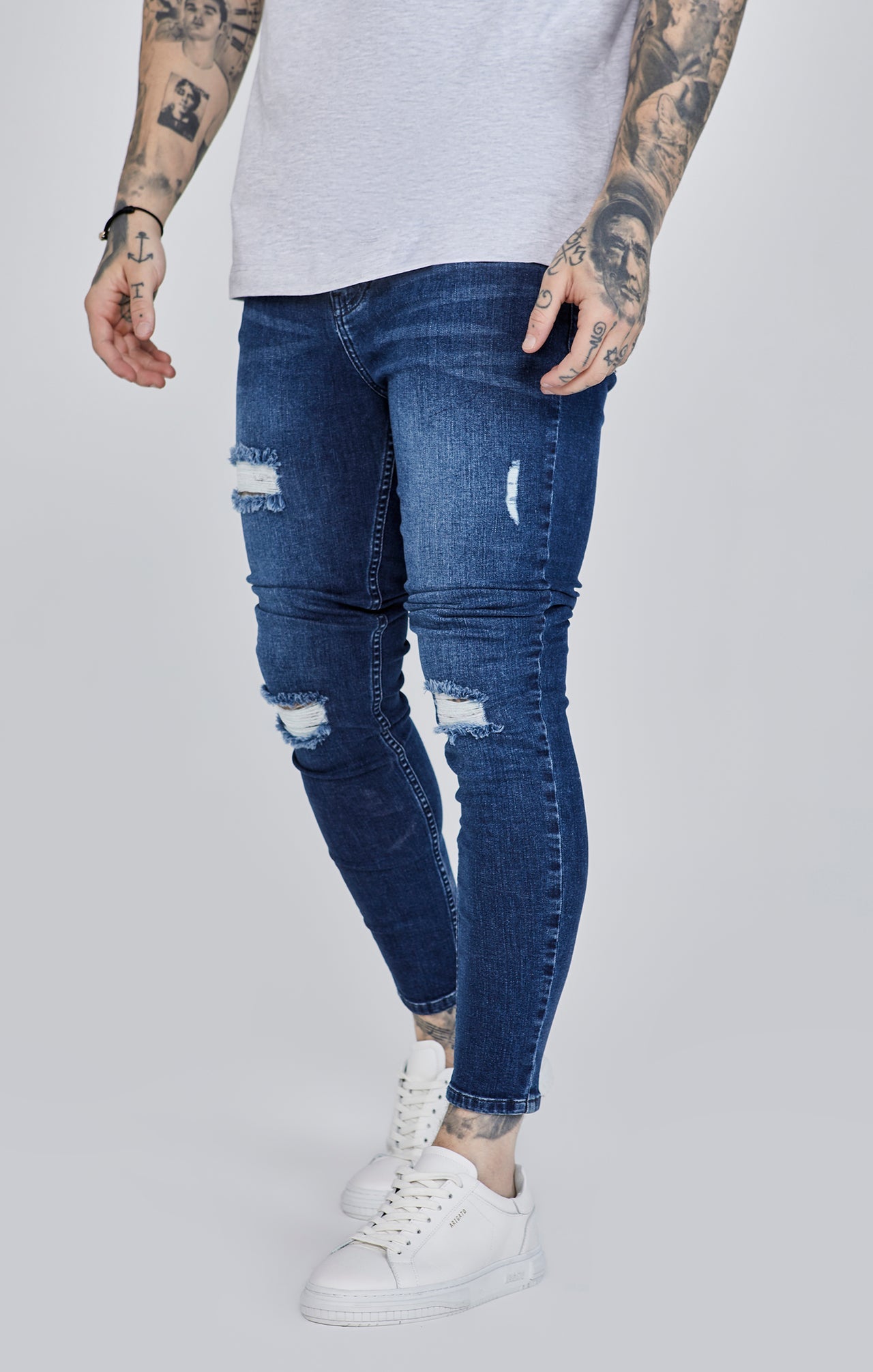 Jeans skinny invecchiati in jeans blu SikSilk   