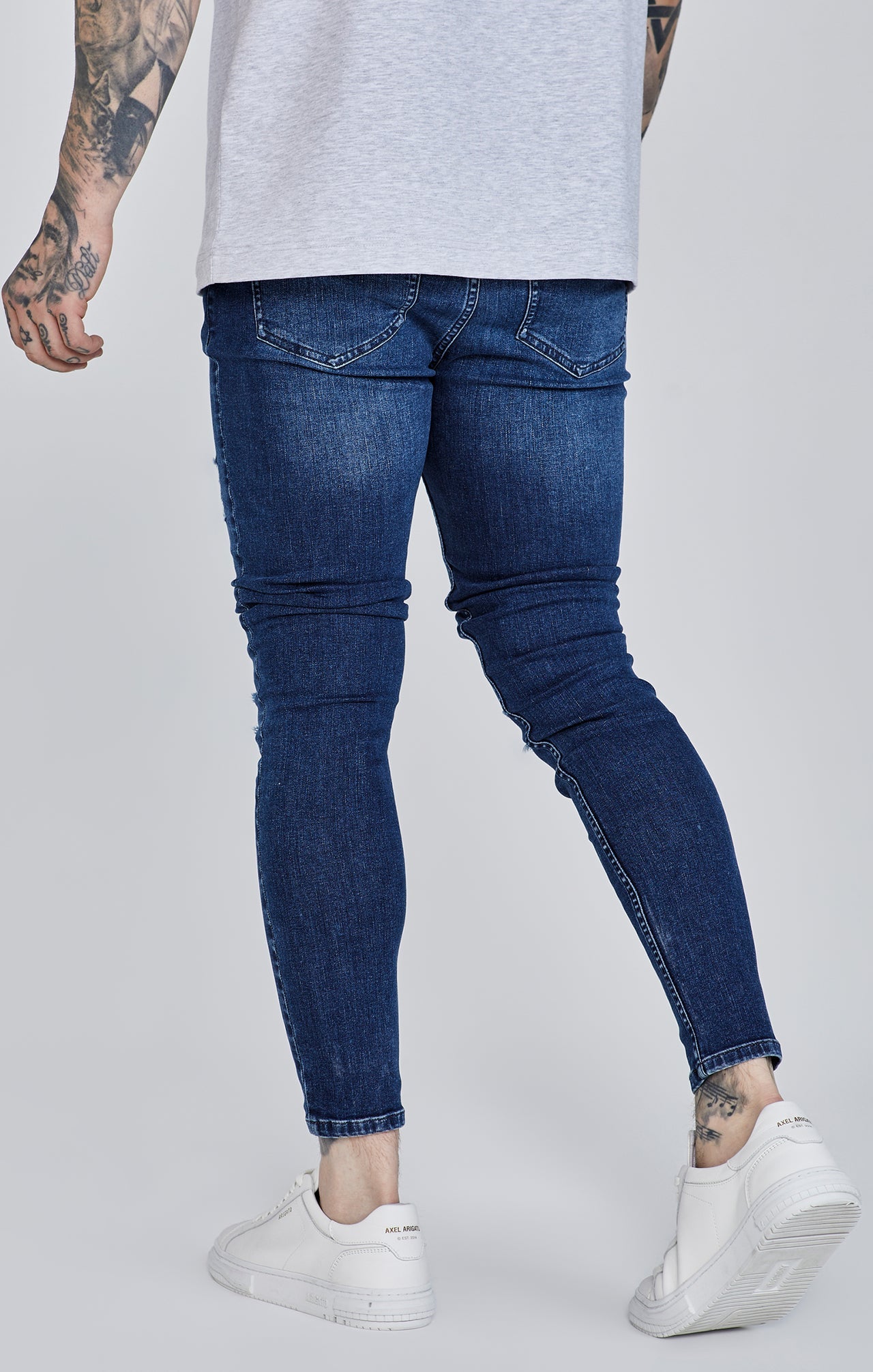 Jeans skinny invecchiati in jeans blu SikSilk   