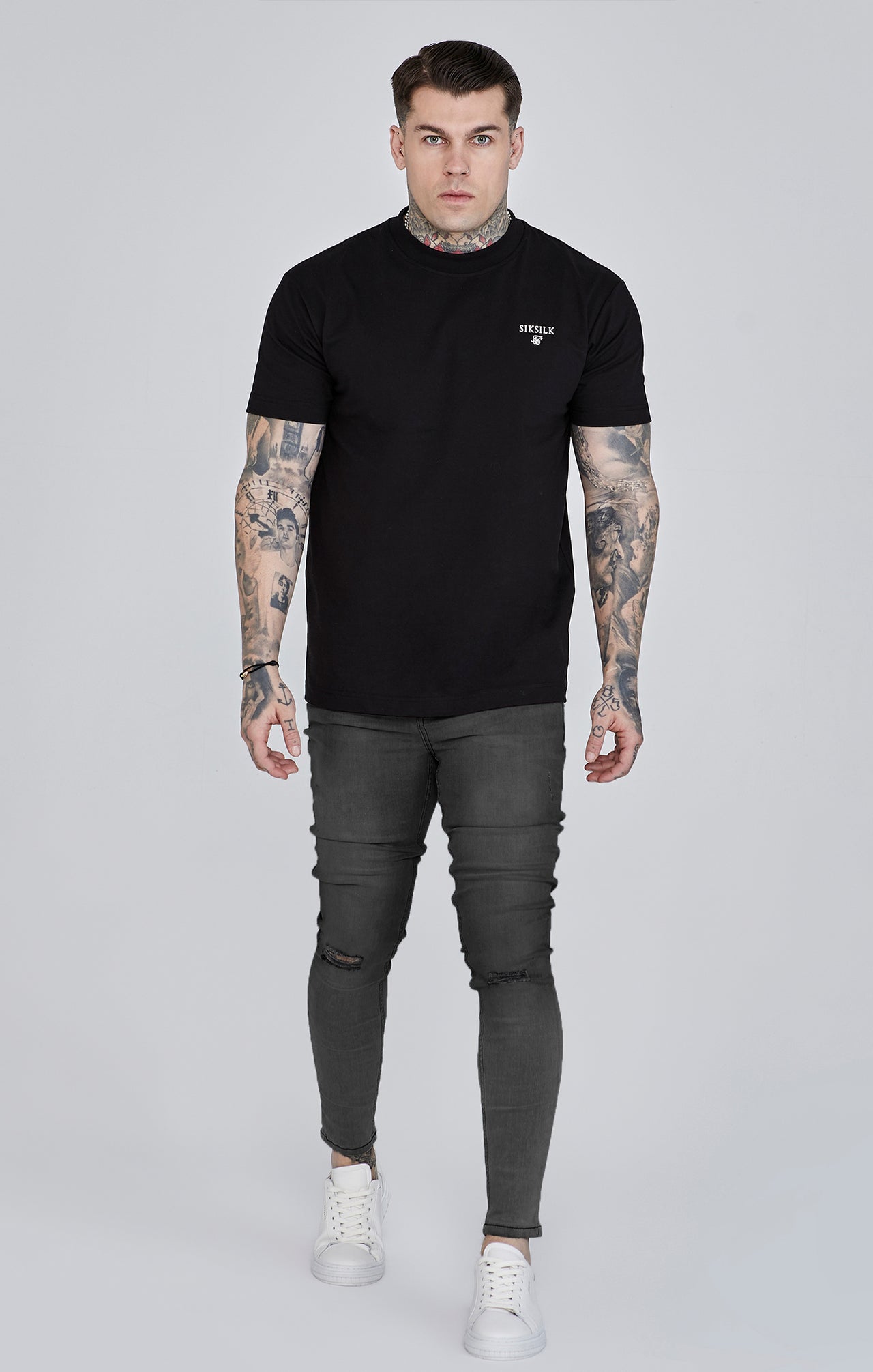 Jeans skinny invecchiati di colore grigio Jeans SikSilk   