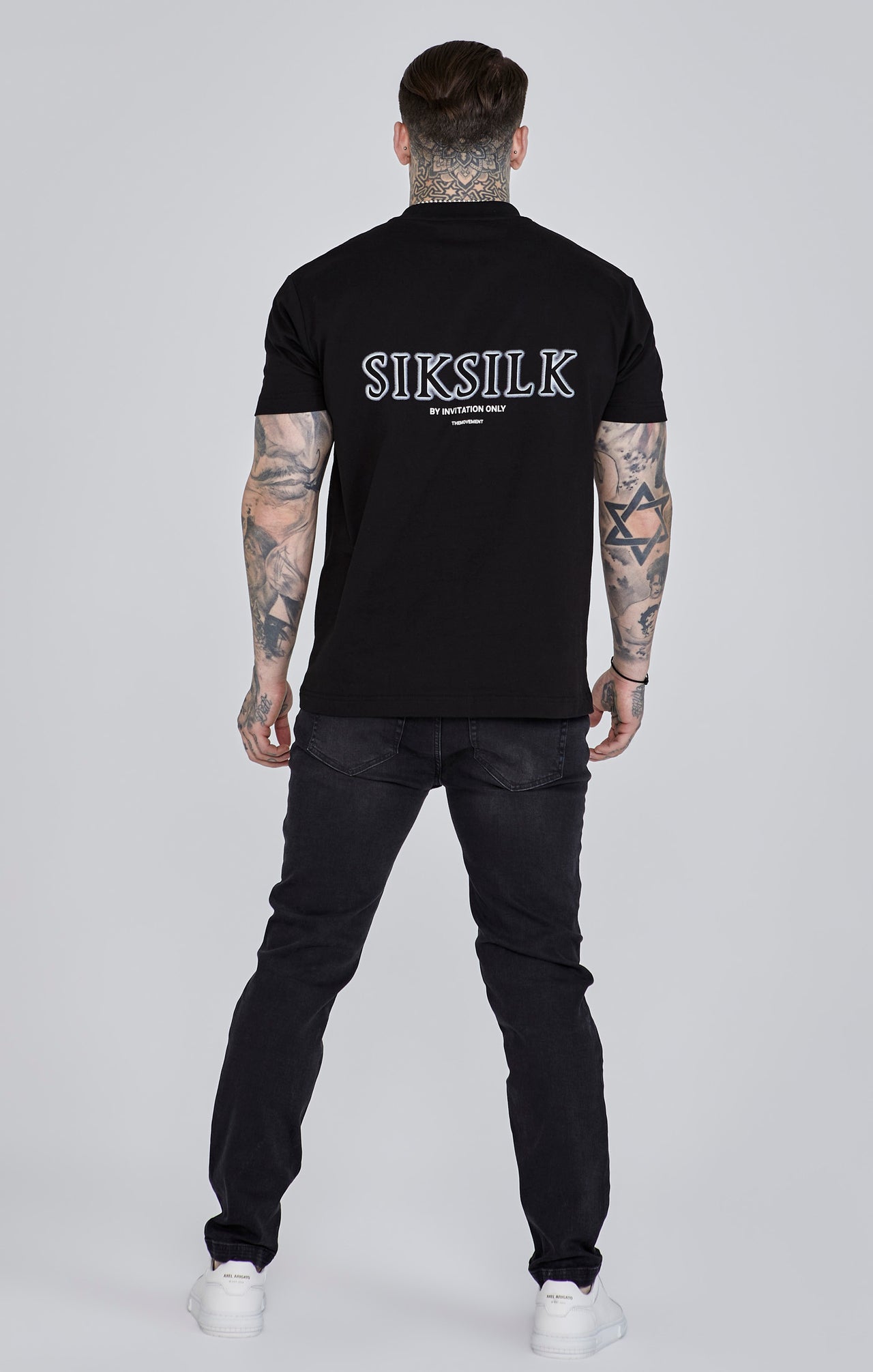 Jeans slim fit invecchiati in nero Jeans SikSilk   