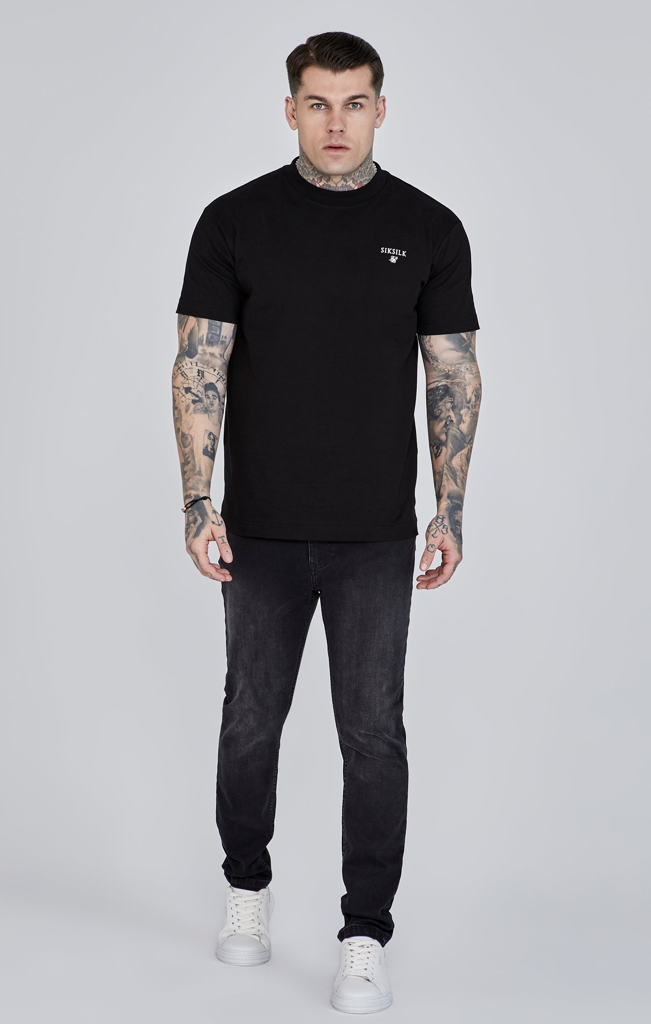 Jeans slim fit in nero Jeans SikSilk   