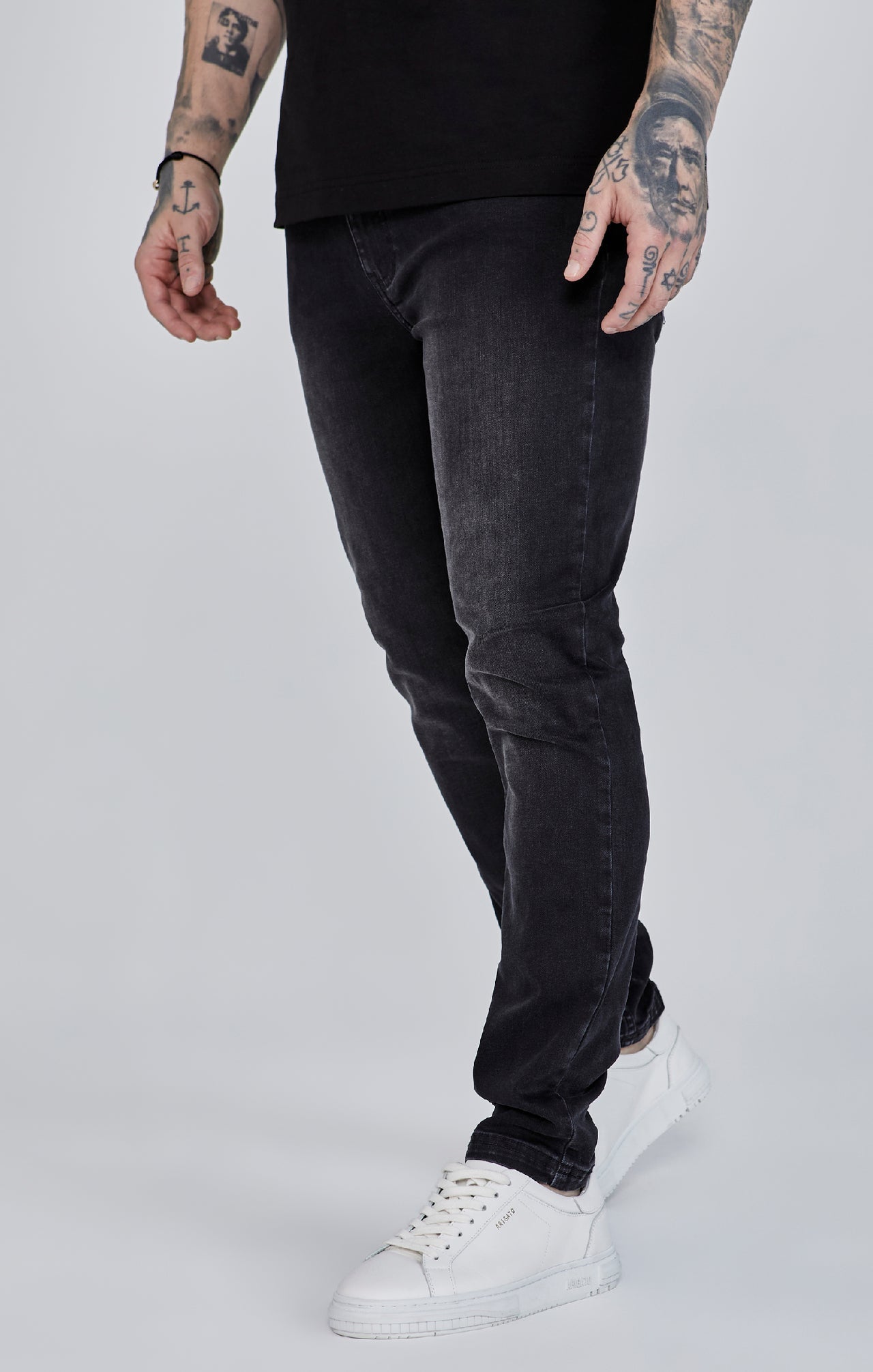 Jeans slim fit in nero Jeans SikSilk   