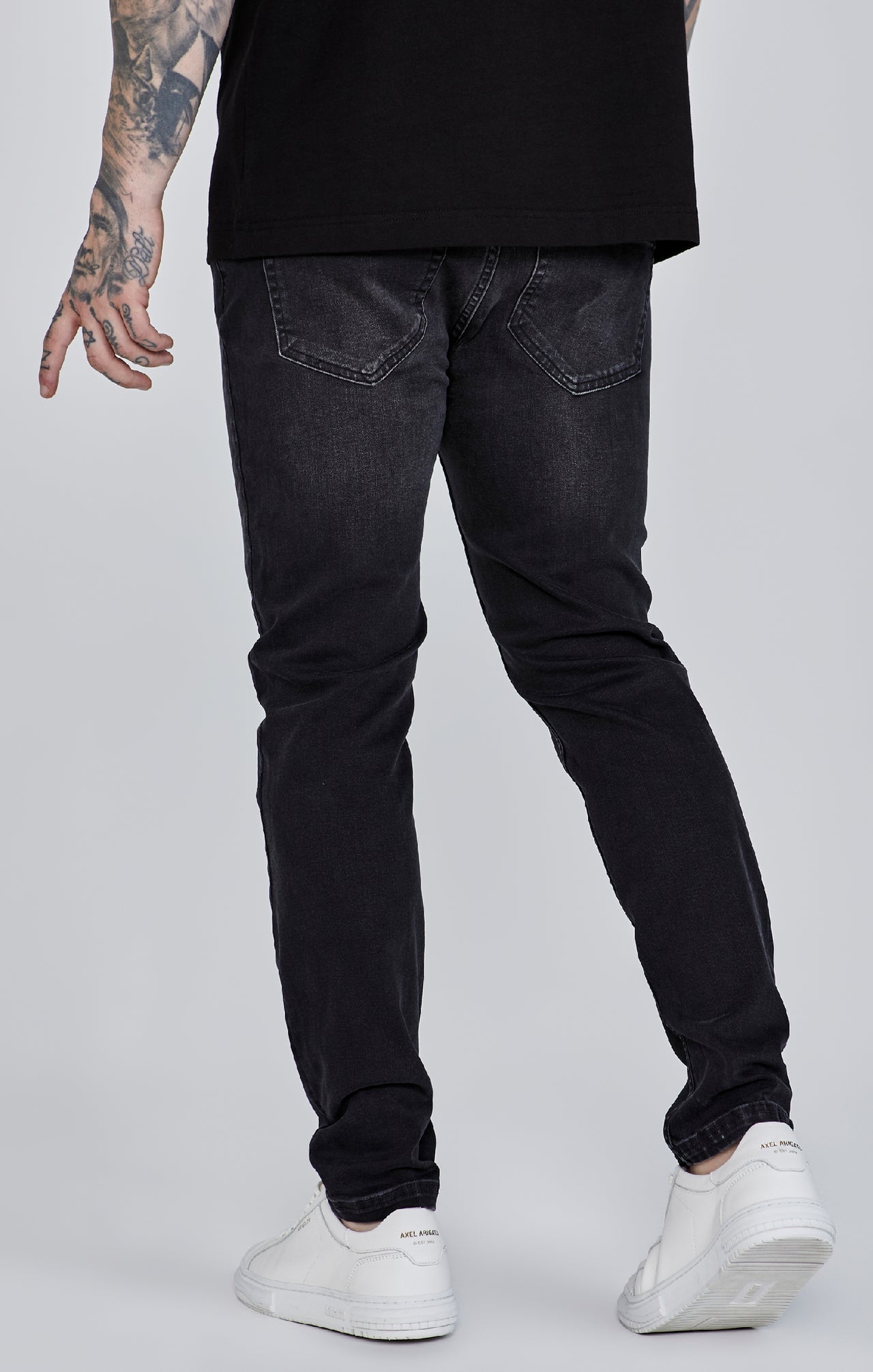 Jeans slim fit in nero Jeans SikSilk   