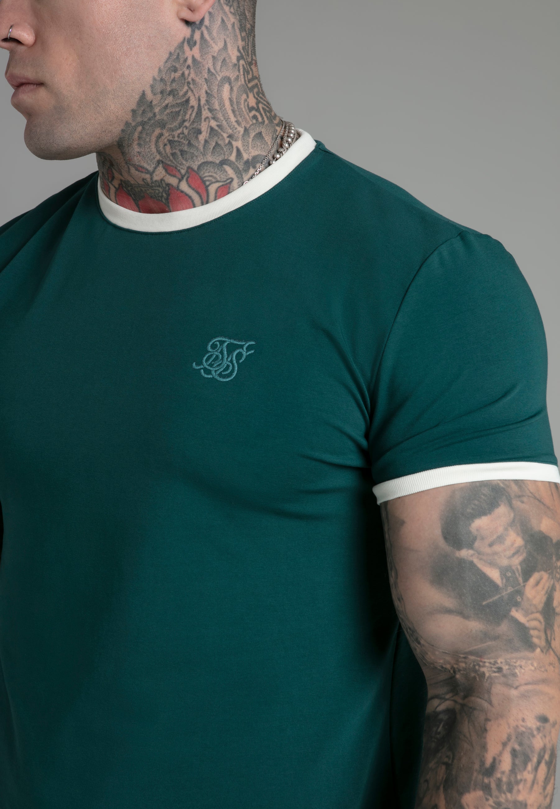 Maglietta Ringer in verde Magliette SikSilk   