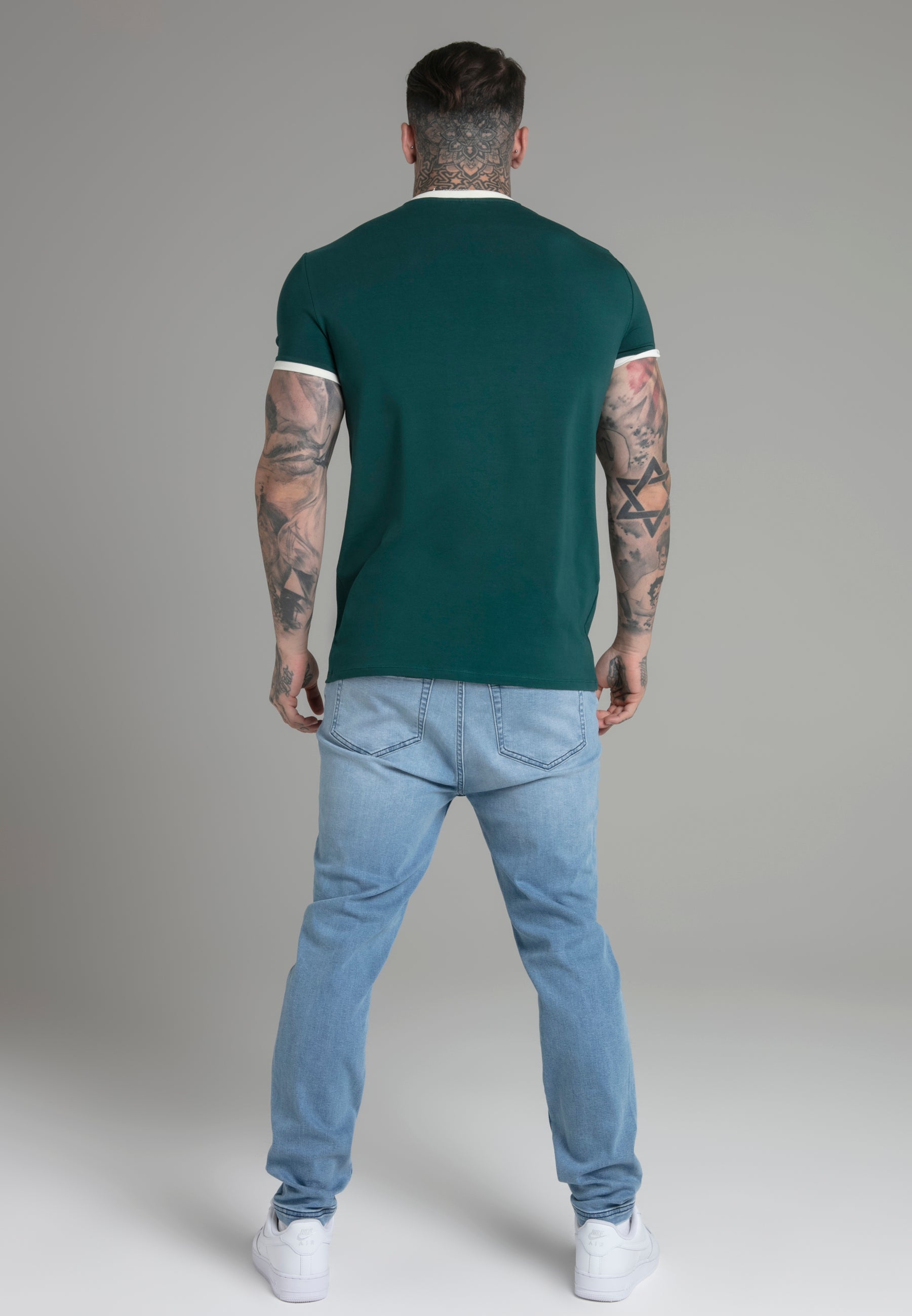 Maglietta Ringer in verde Magliette SikSilk   