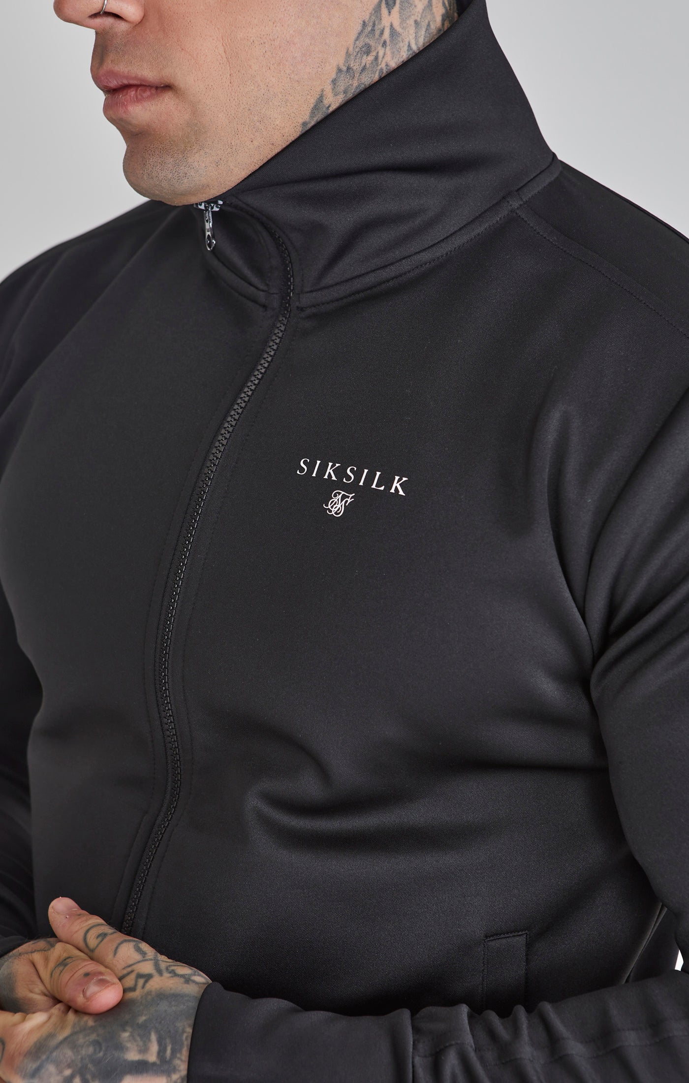 Essentials Poly Track Top in nero Giacche da ginnastica SikSilk   