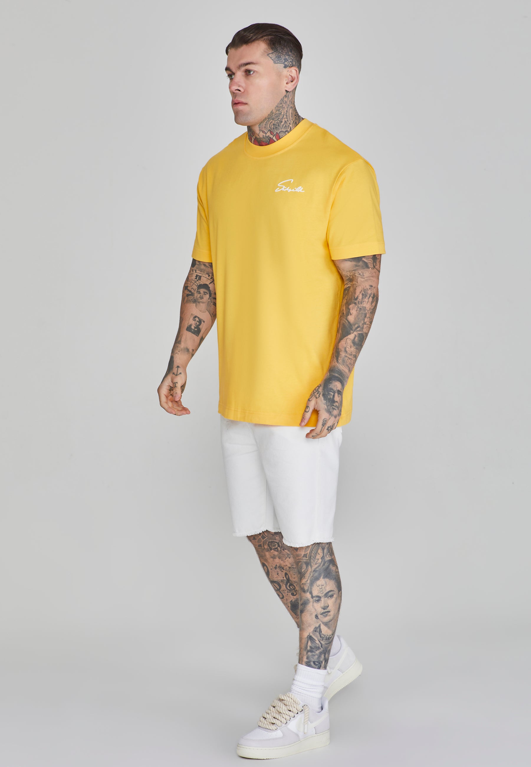 Maglietta Script in giallo Magliette SikSilk   