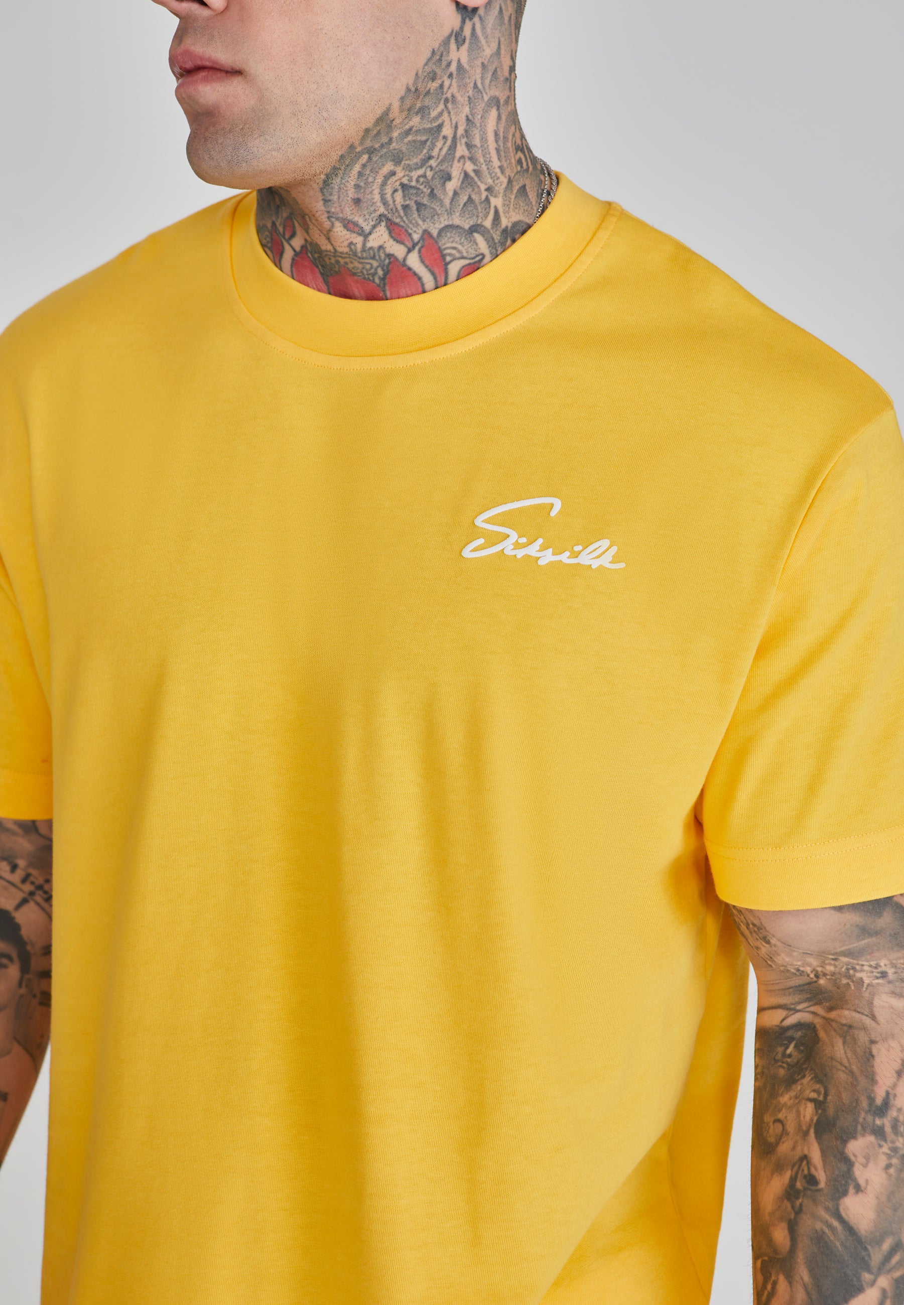 Maglietta Script in giallo Magliette SikSilk   