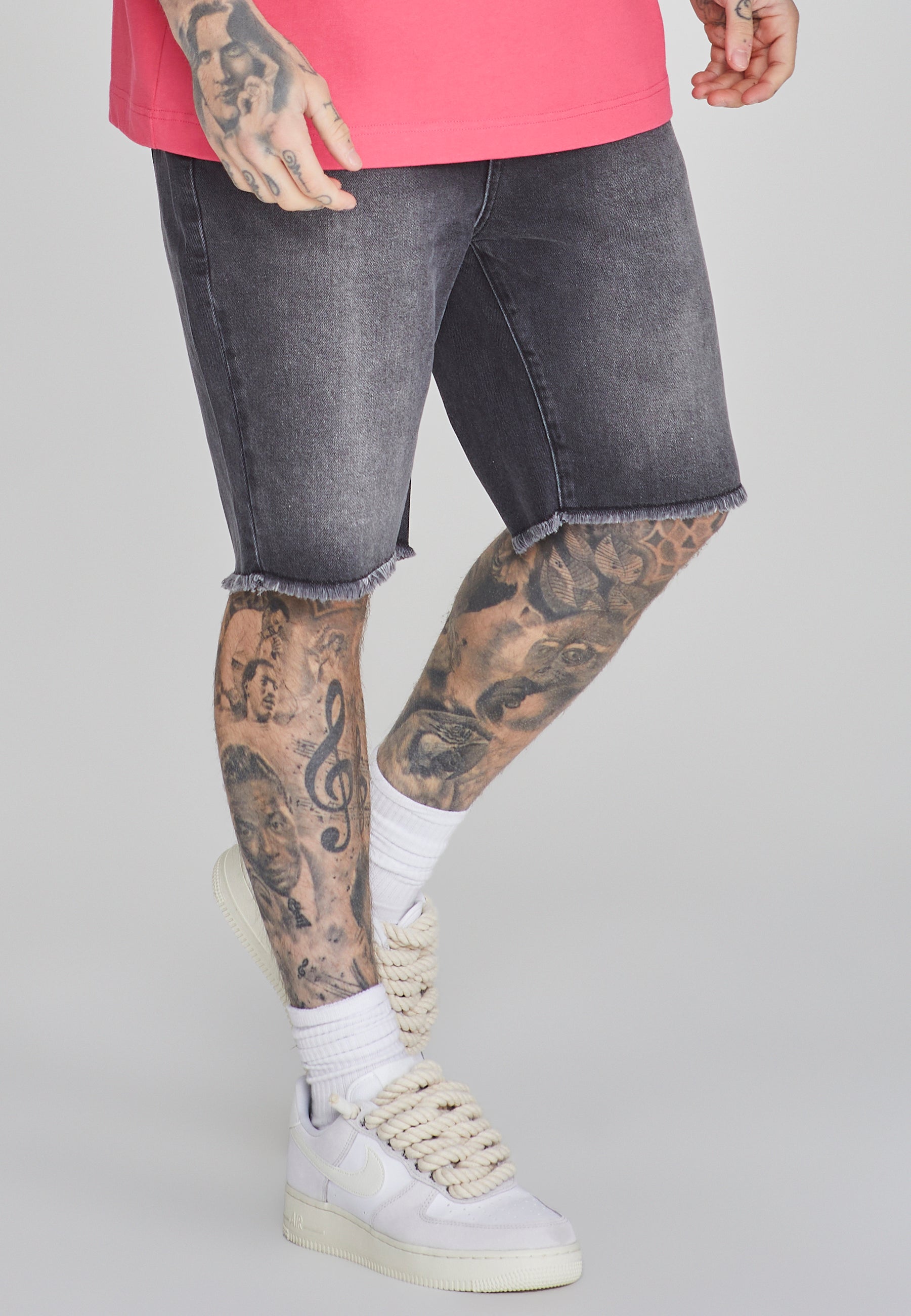 Pantaloncini di jeans in nero SikSilk   