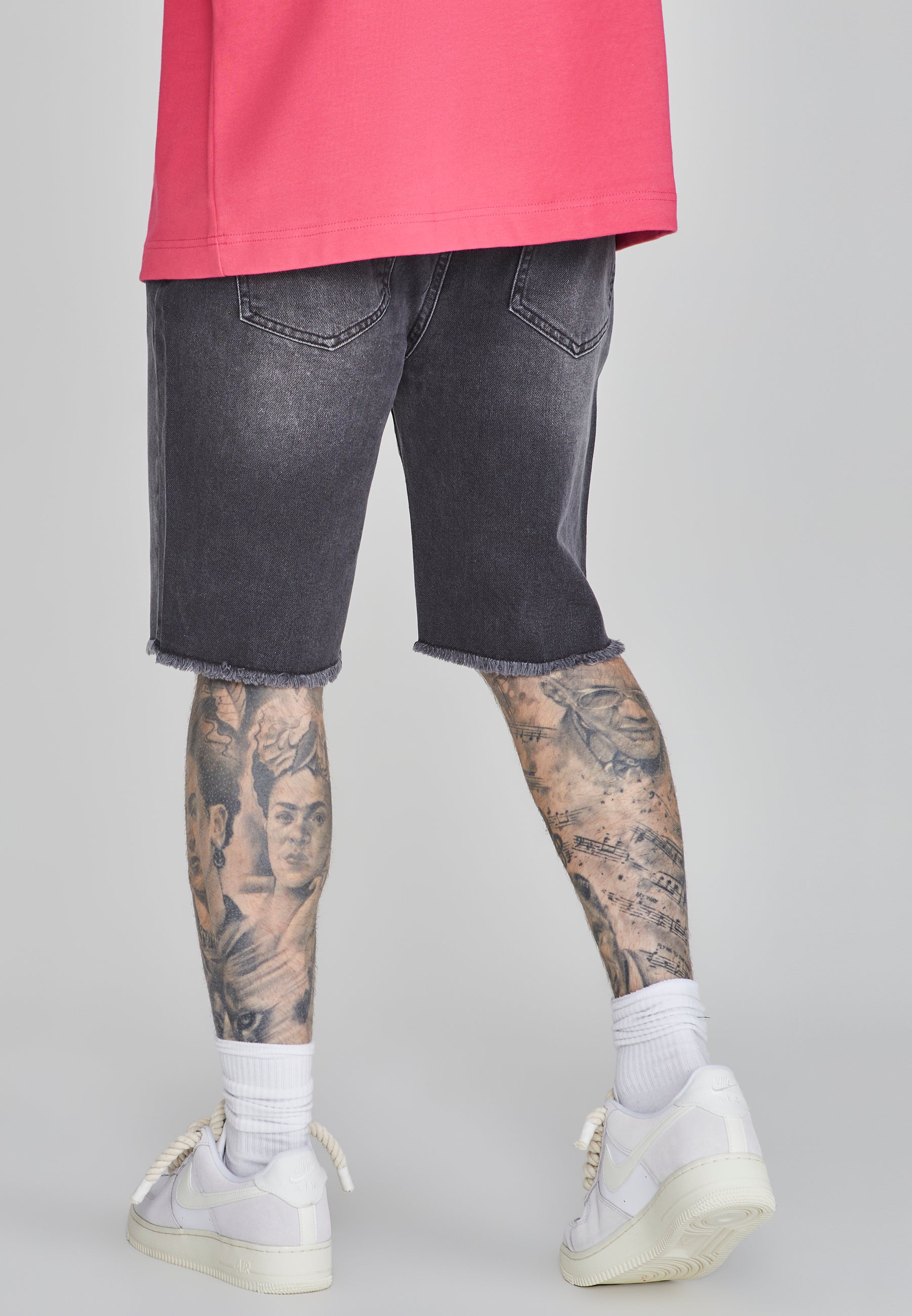 Pantaloncini di jeans in nero SikSilk   