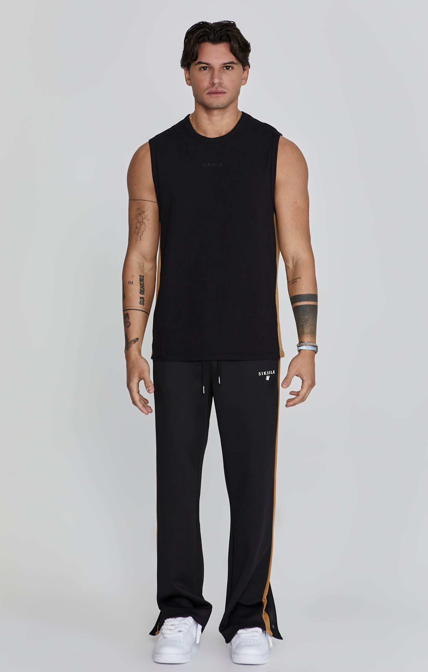 Pantaloni da corsa in nero Pantaloni SikSilk   