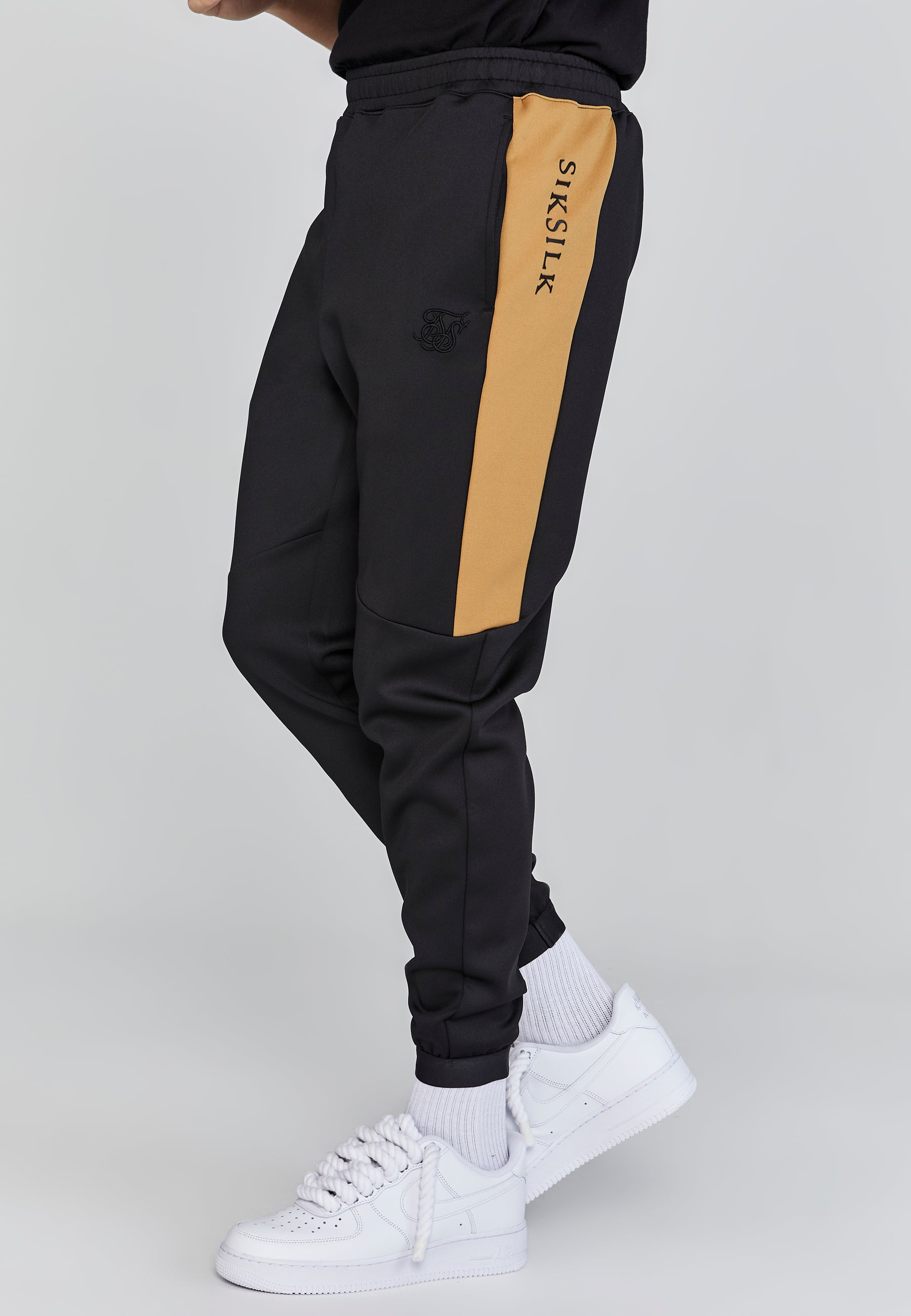 Joggers muscolosi in nero Pantaloni SikSilk   