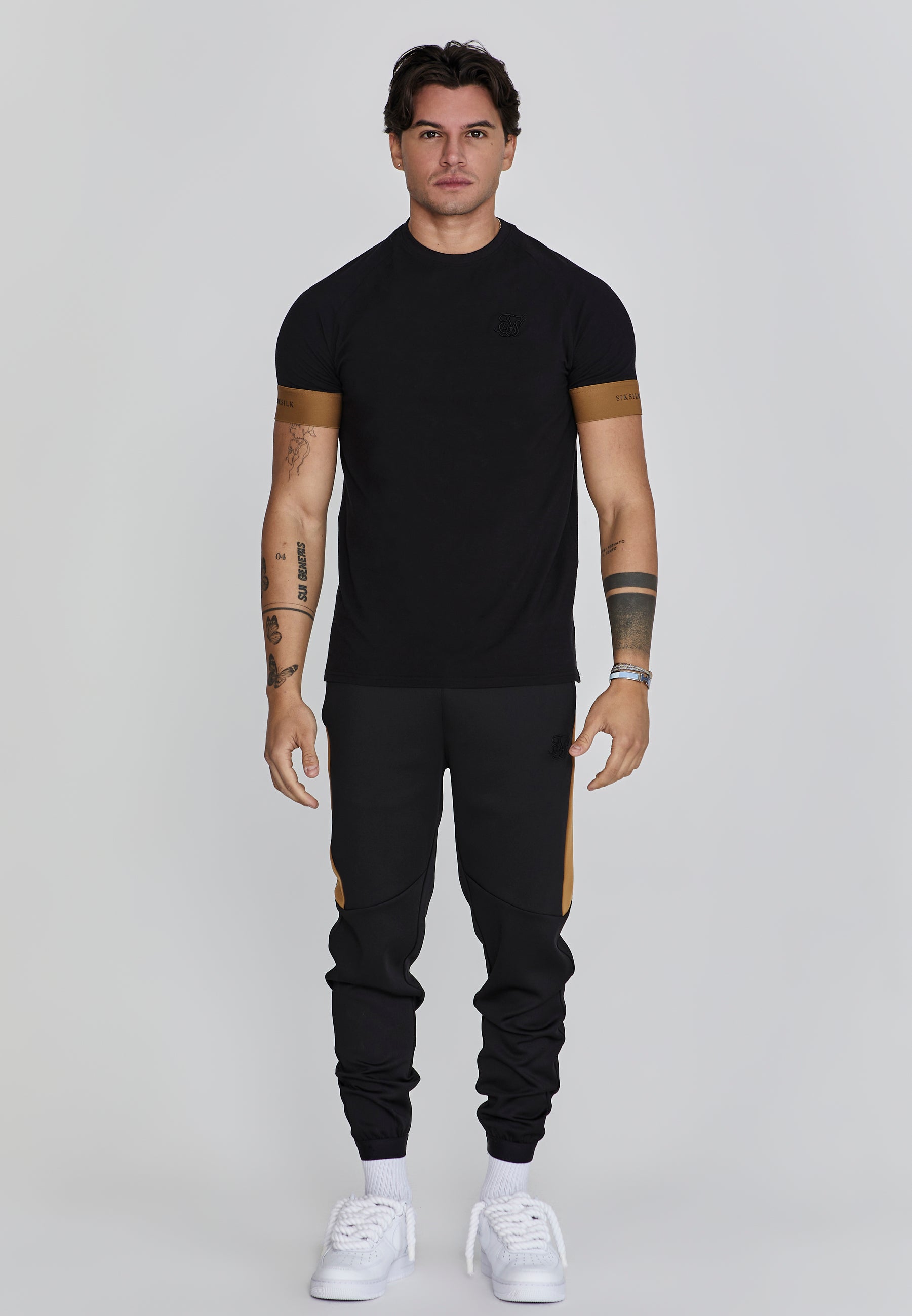 Joggers muscolosi in nero Pantaloni SikSilk   